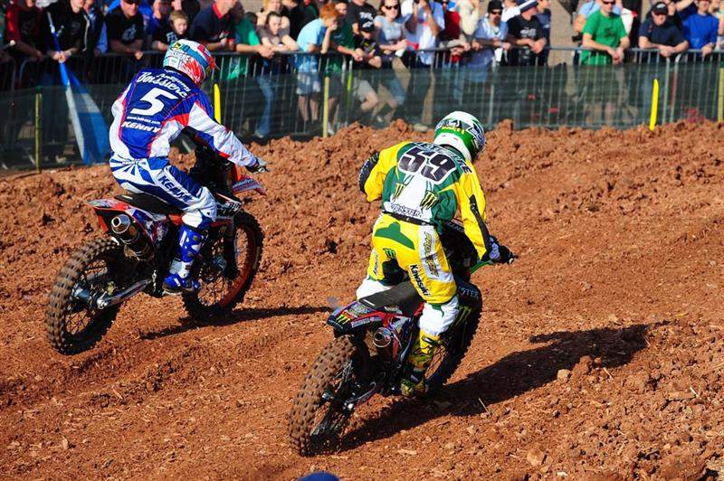Brett Metcalfe (59) sneaks around France's Anthony Boissiere in MX2