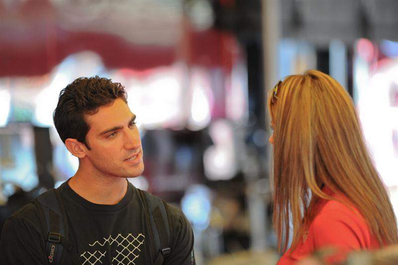 Sebastien Tortelli (left) talks with Erin Bates about training Blake Wharton.