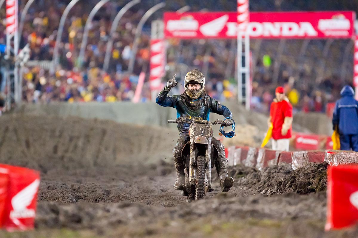 Kevin Windham celebrates the heat race win