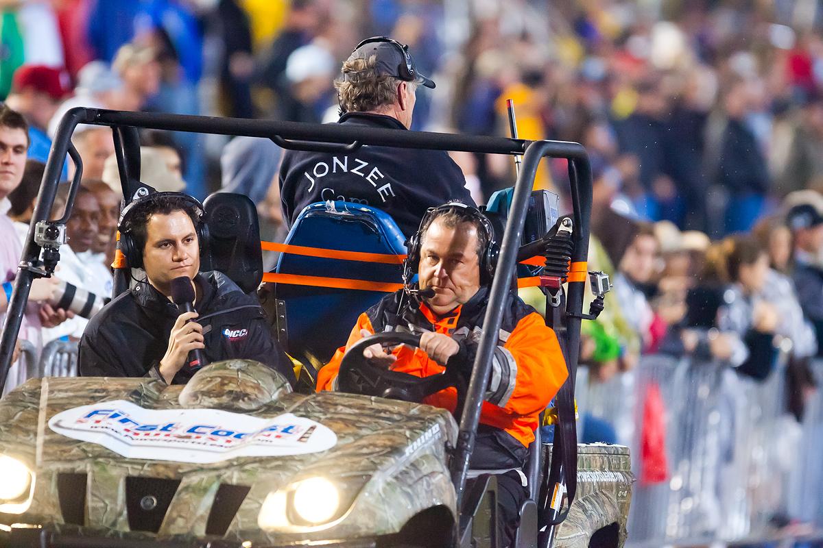 Weege and Cliff Nobles riding next to the track.