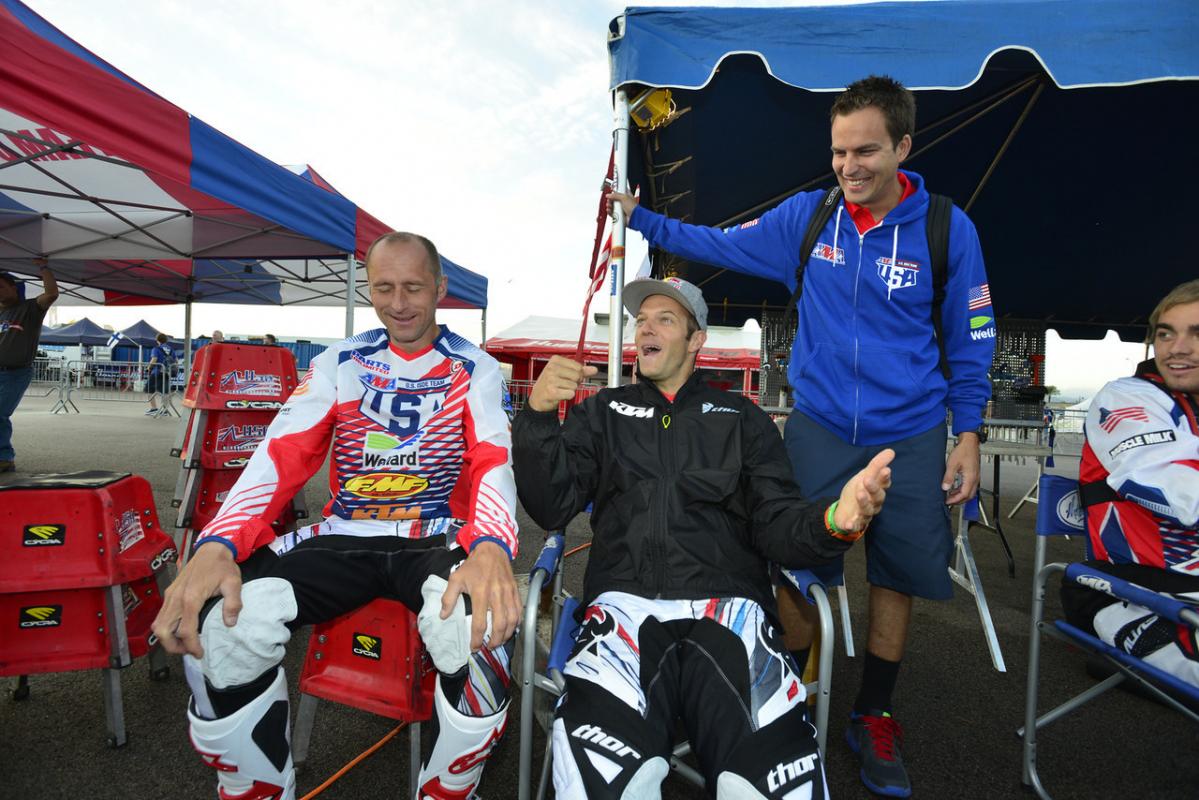 Kurt Caselli jokes around with teammate Mike Brown and US Team manager Antti Kallonen before the start of Day-one at this years ISDE.