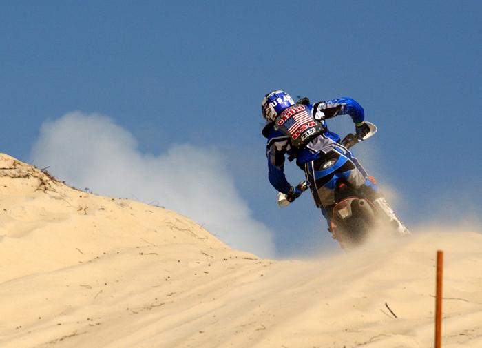 US Junior Trophy Team rider Kurt Caselli crests a sand dune during the 2003 ISDE held in Brazil where he finished