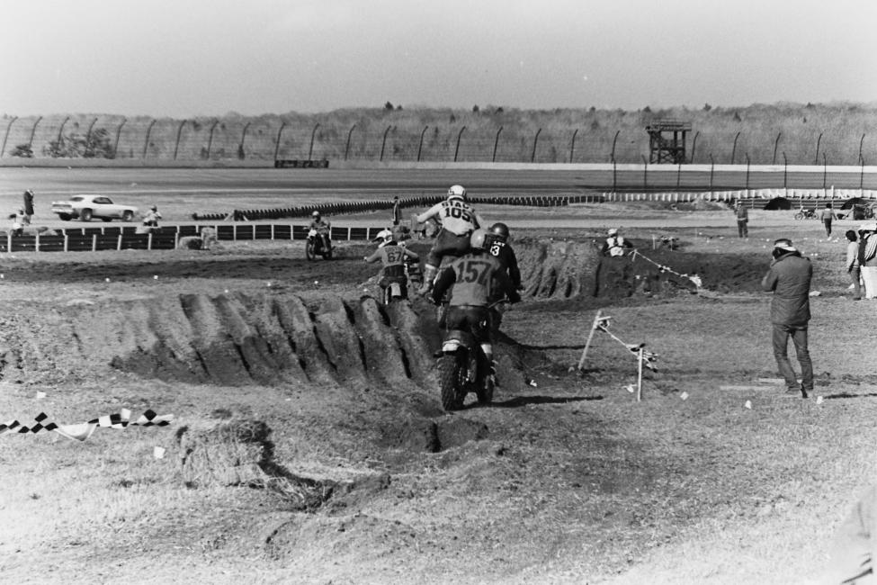 The Pocono International Raceway track. (That's a glimpse of Gary Bailey battling with Frank Stacy (105) and John Ayers—yes, that John Ayers—on the #157.)