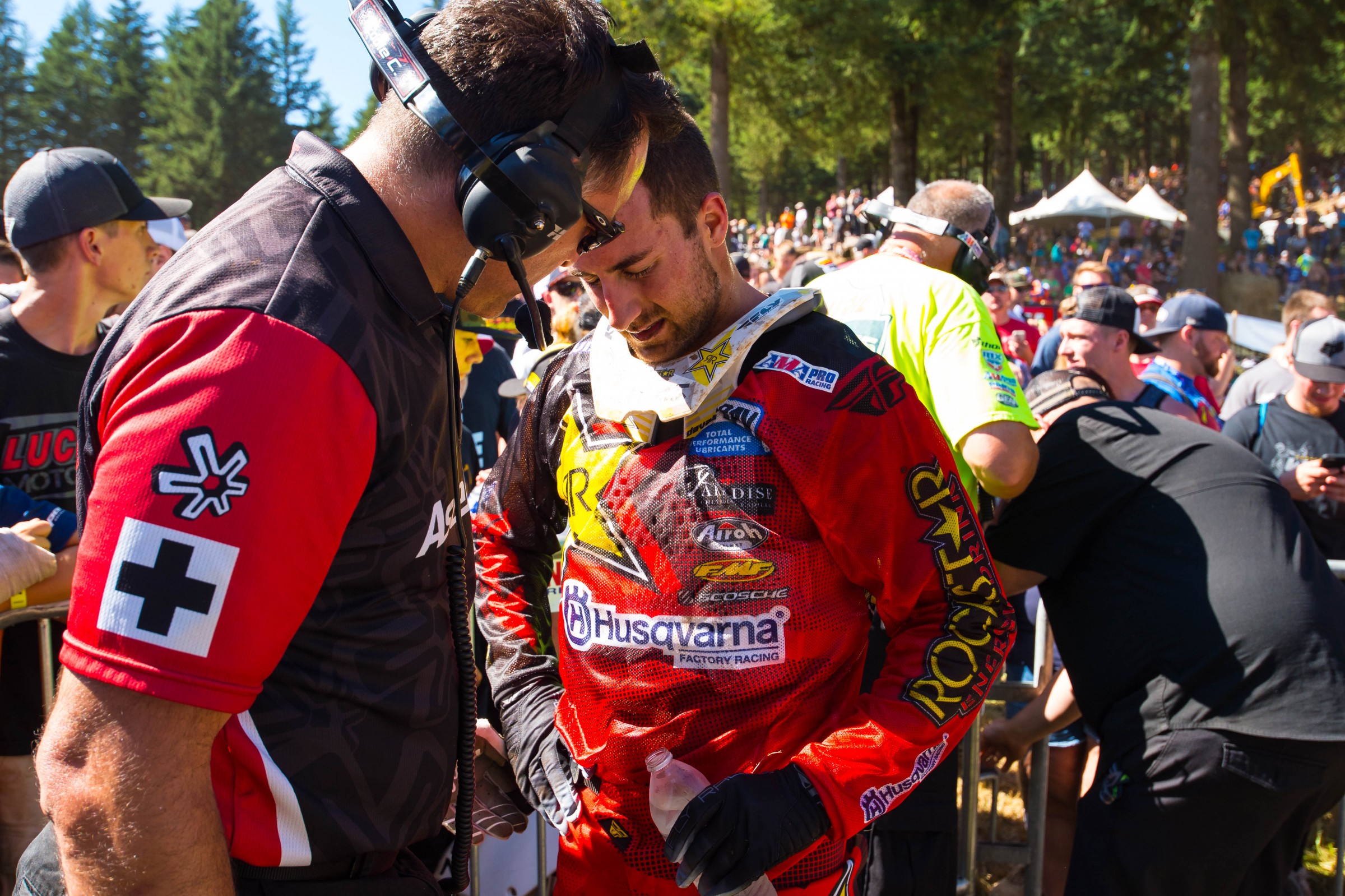 Davalos talks with a member of the Asterisk medical crew following his crash.