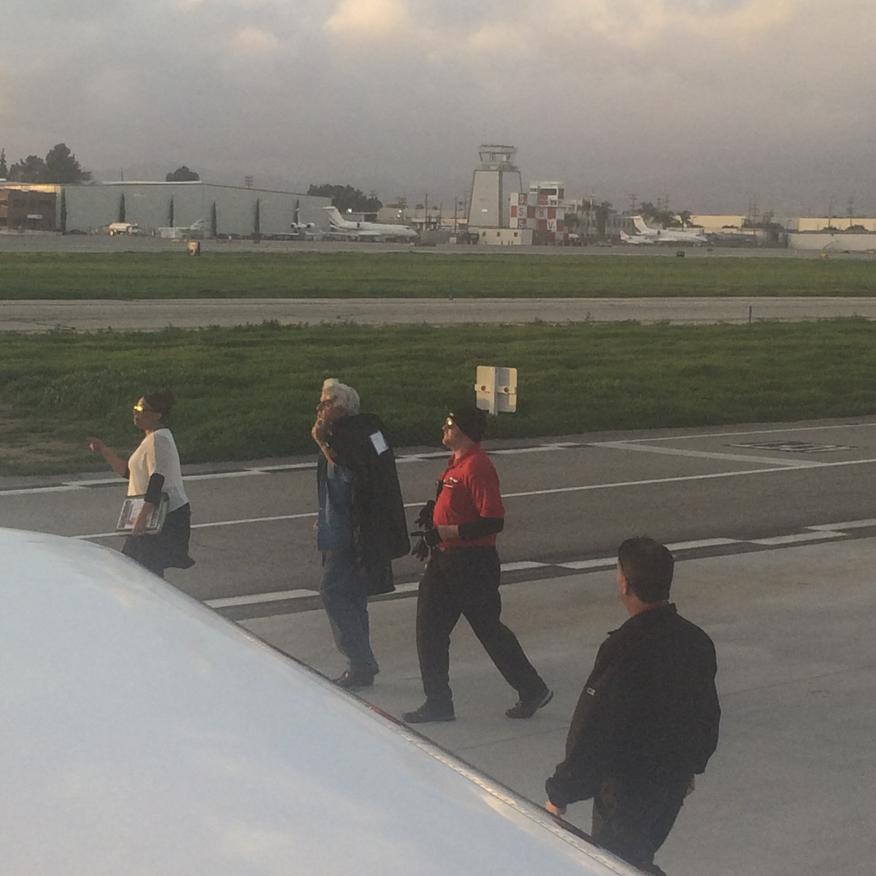 Here's Jay Leno figuring which one of his 17,000 vehicles he wants to take.