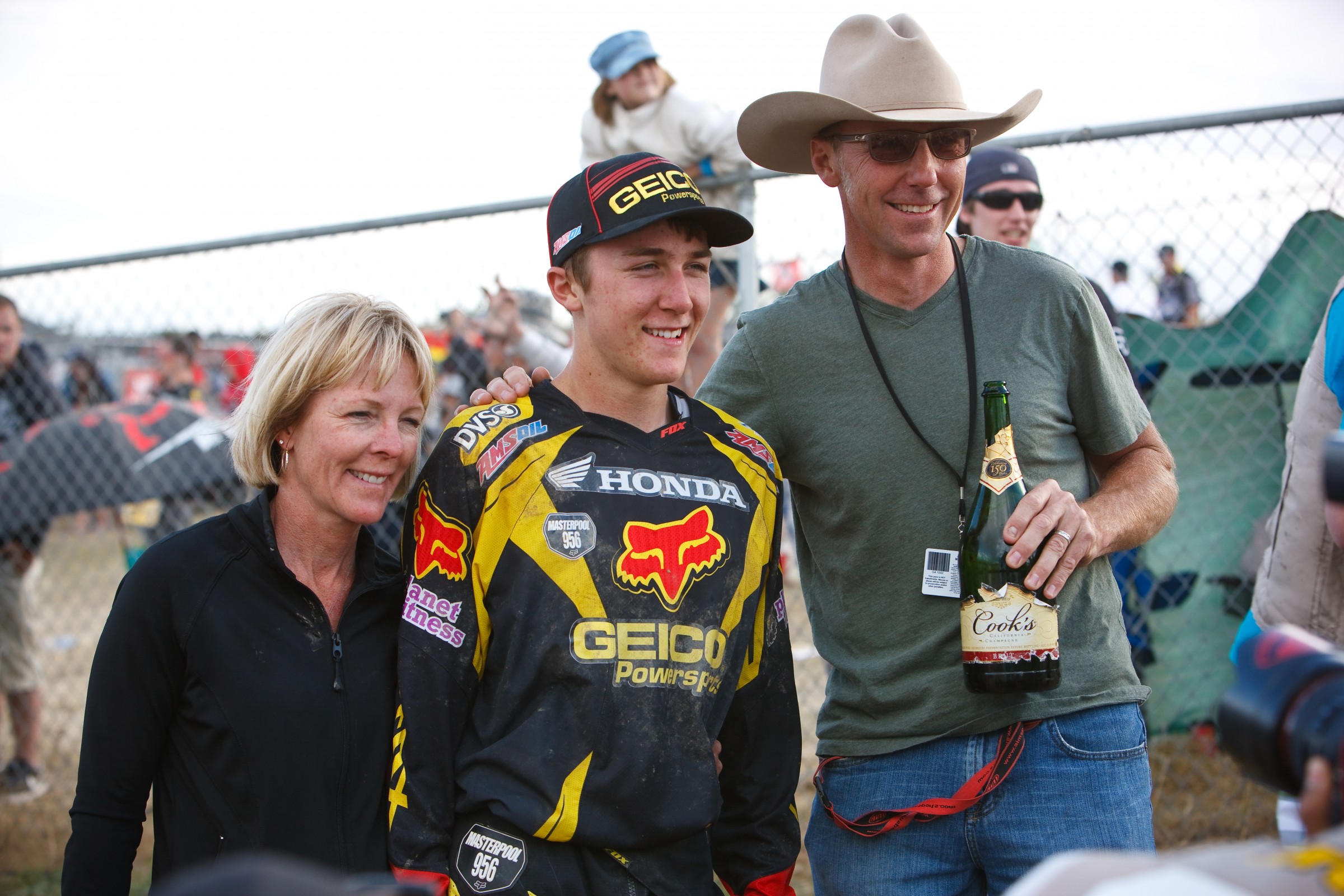 Eli celebrates his first career victory with his parents.
