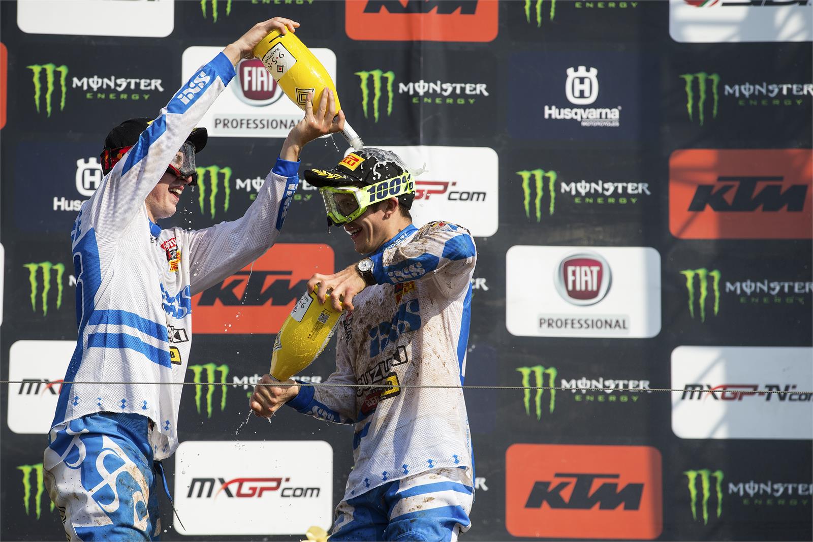 Seewer and Lawrence celebrate on the podium.