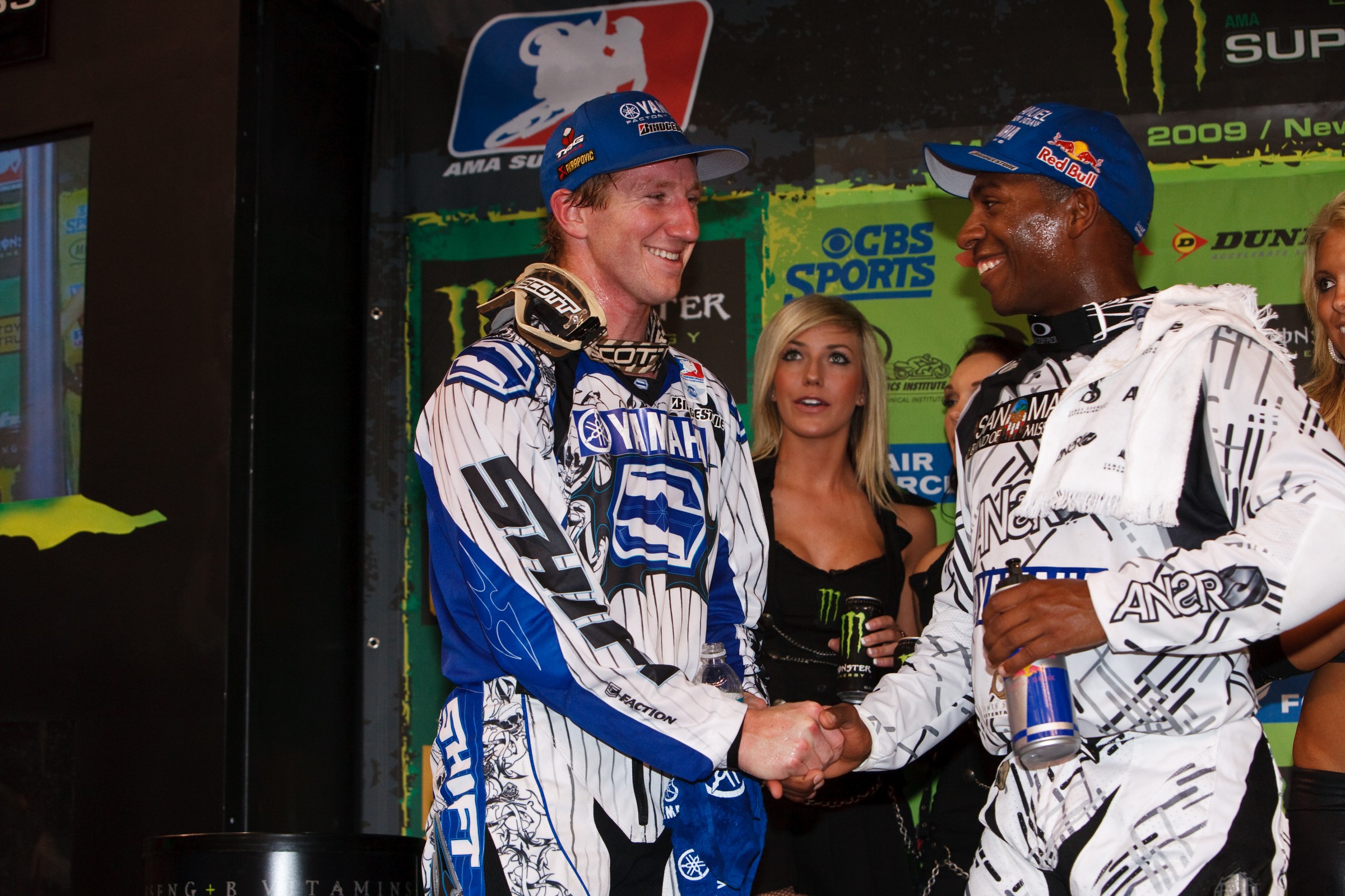 Hepler and James Stewart shake hands on the podium in Monster Energy Supercross.