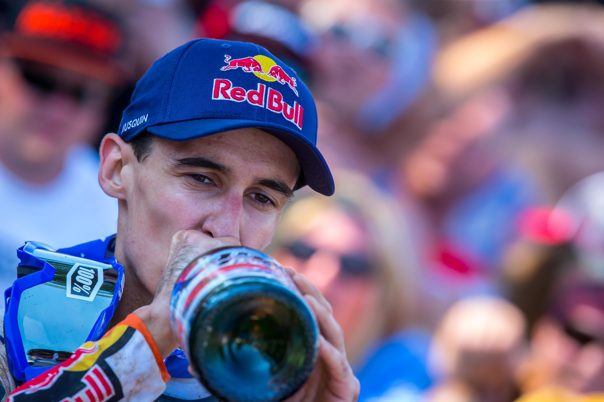 A little bit of champagne on the podium will make any injury feel better.