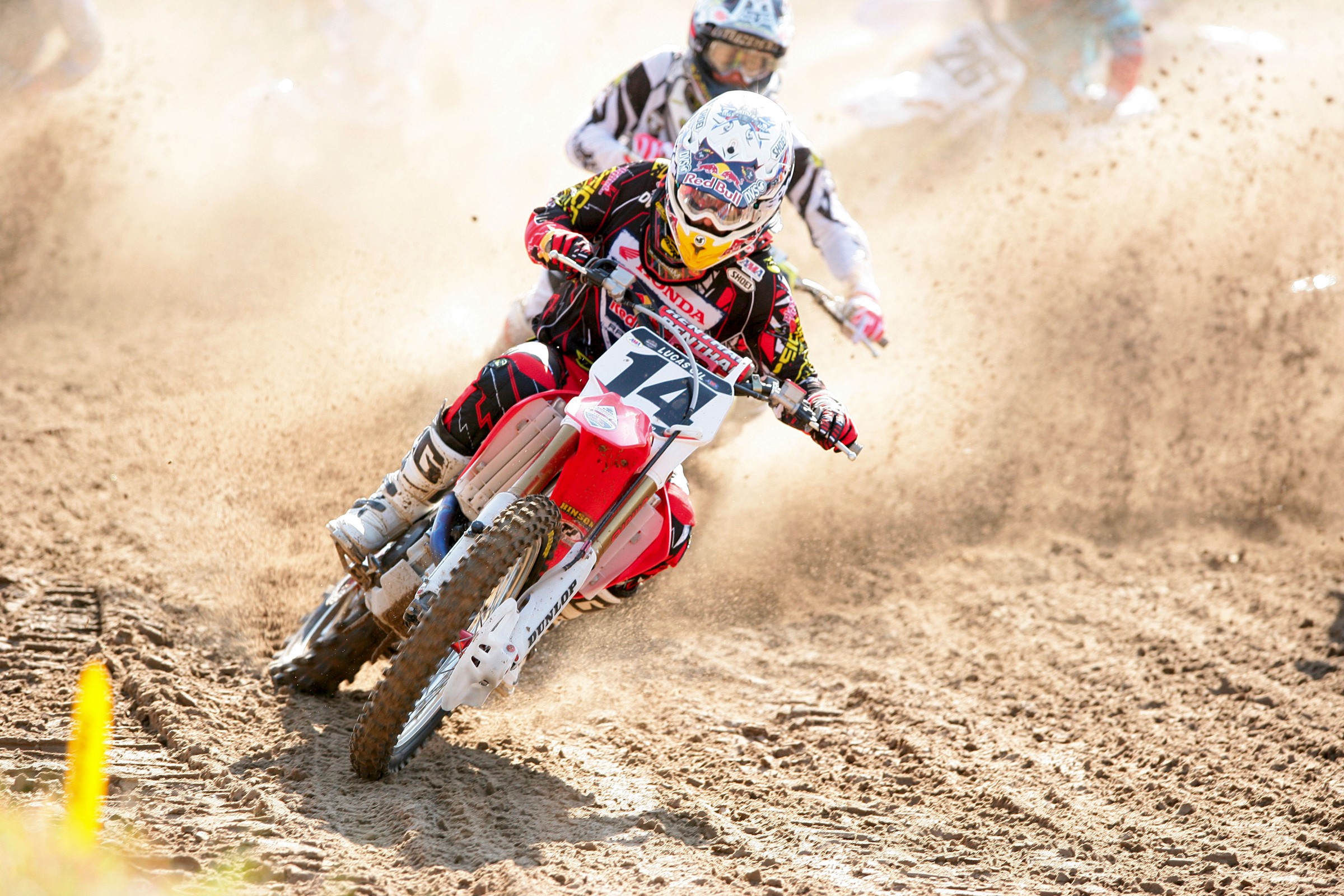 I do like back lit shots and they don’t get much better than this one of Kevin Windham holeshoting Ryan Dungey.