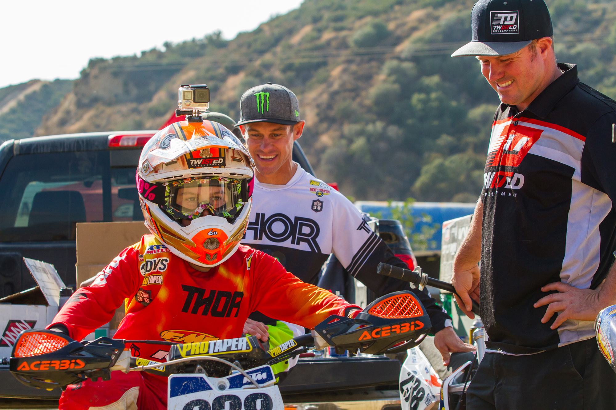 Ellis (right) working with Brian and his son.