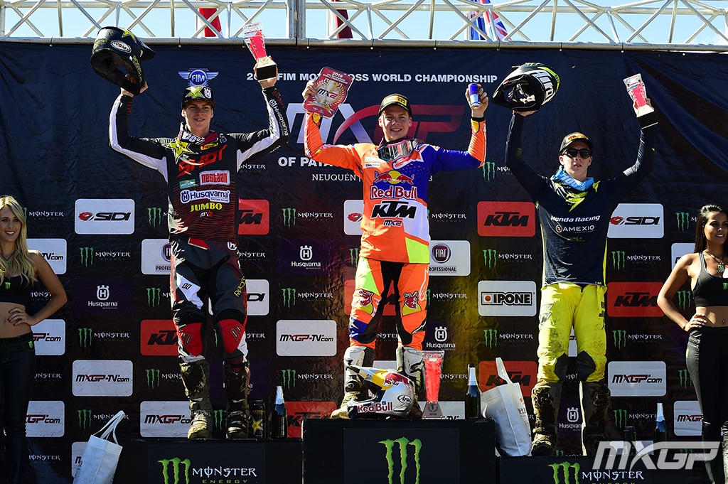Jonass (center) will carry the red plate into the next round.