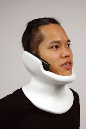 Neck brace with a cell phone holder? Tell me more.