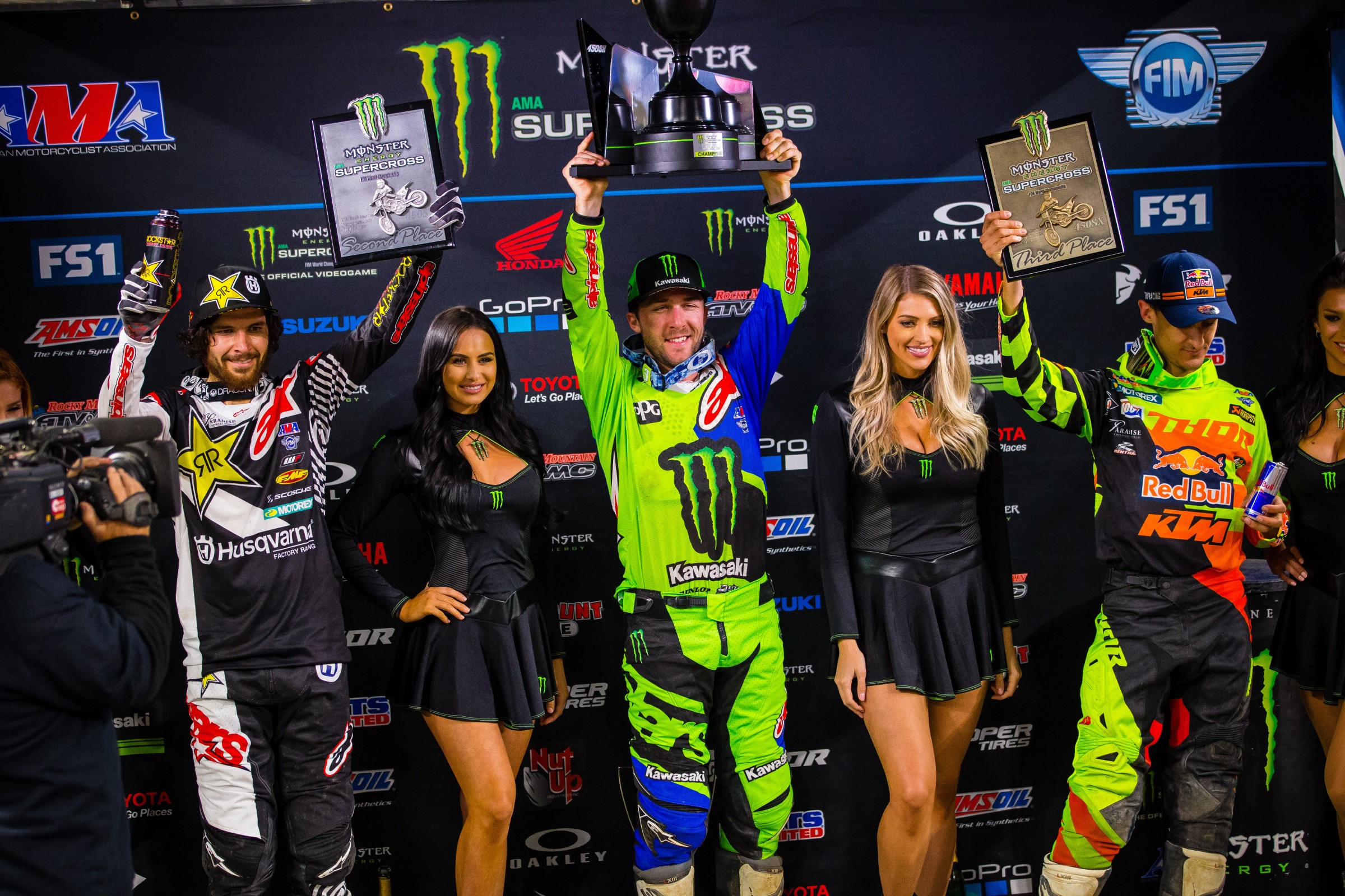 Tomac (center) was both the overall winner of the night and the Triple Crown Champion.