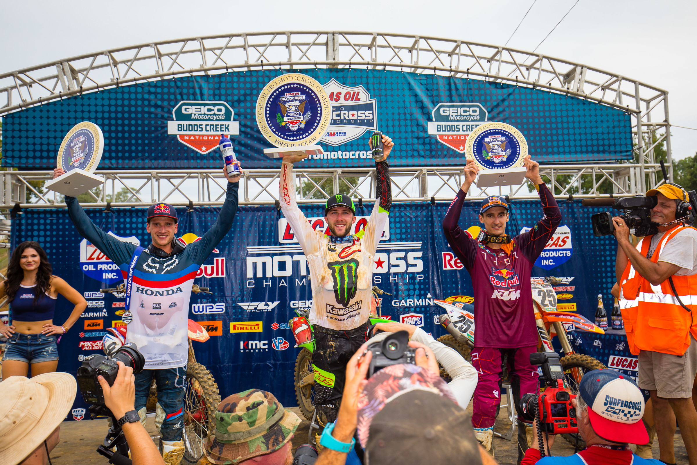 Tomac (center) finished first overall, followed by Roczen (left), Musquin, and Baggett.
