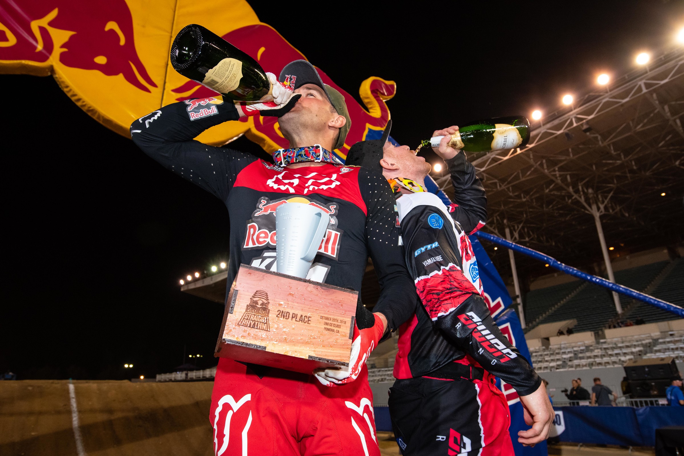 The Ryans share a celebratory drink of champagne after the race.