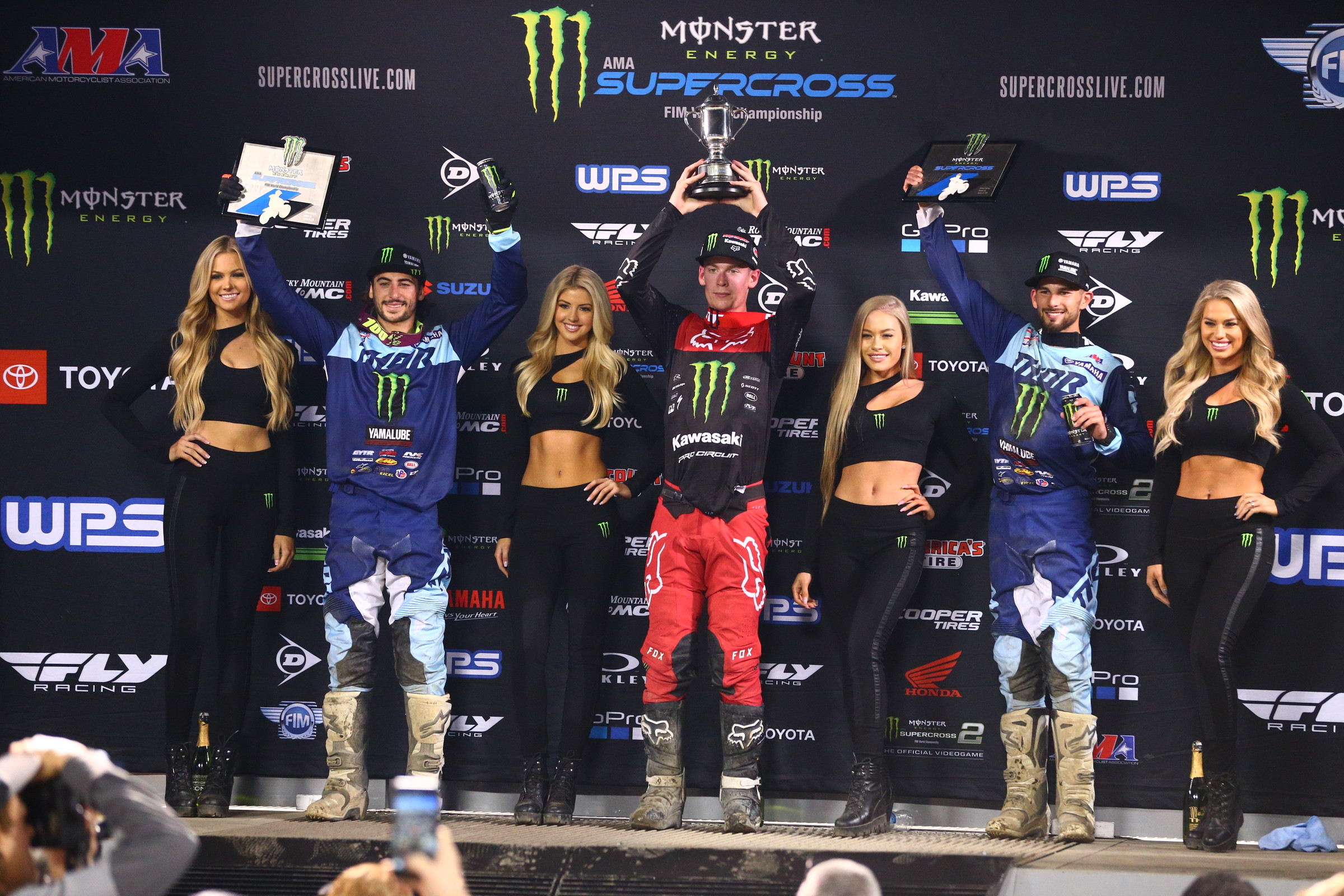 Who will be standing in the middle of this picture next week?