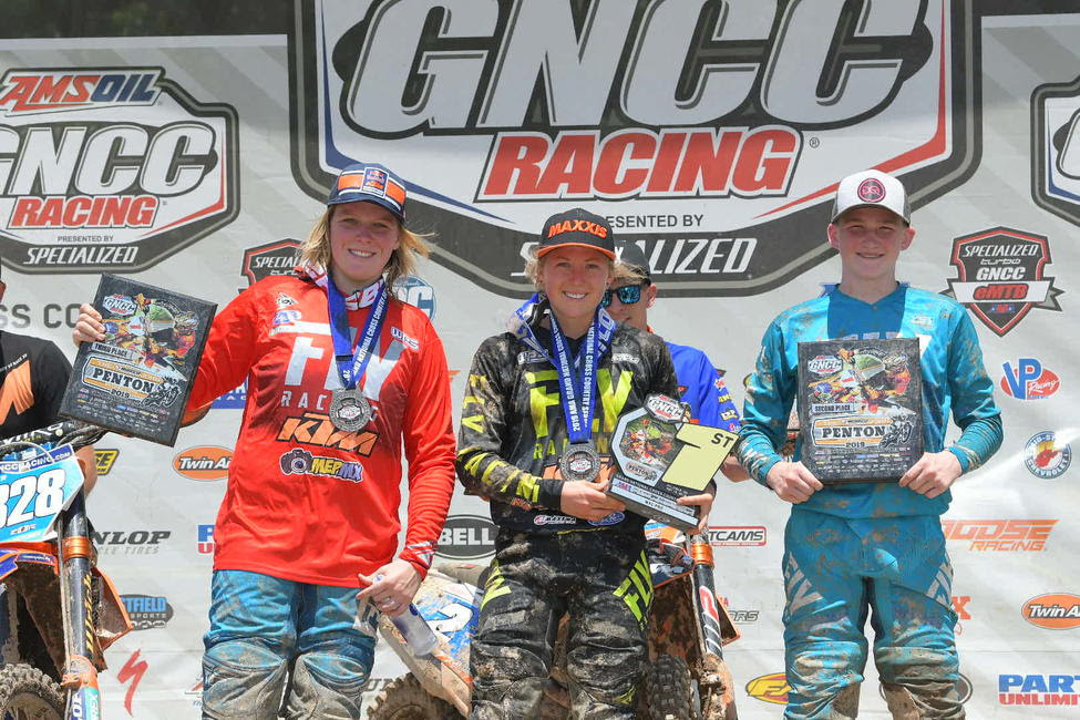Becca Sheets (center), Lucas Grounds (right), and Mackenzie Tricker (left) made up the 10 a.m. overall podium.