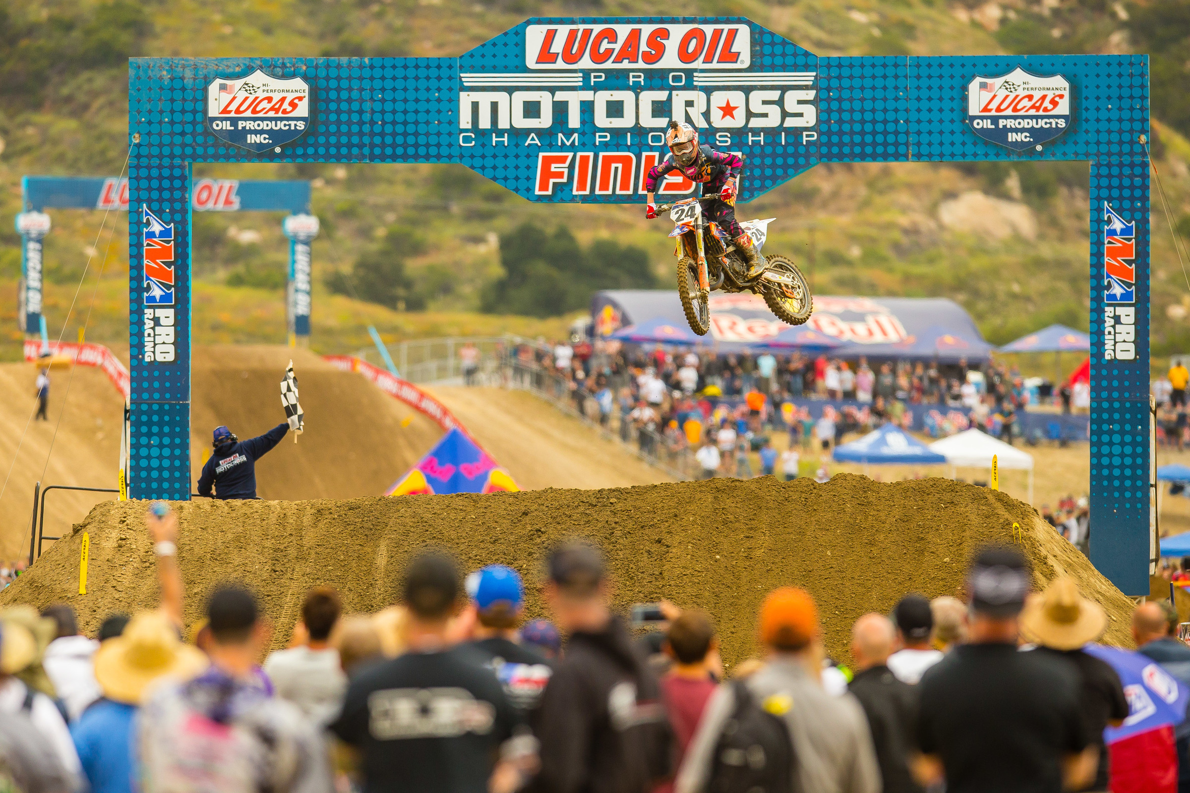 Varize taking the checkered flag in the 125 All Star race during a break in Saturday's action at Fox Raceway at Pala.