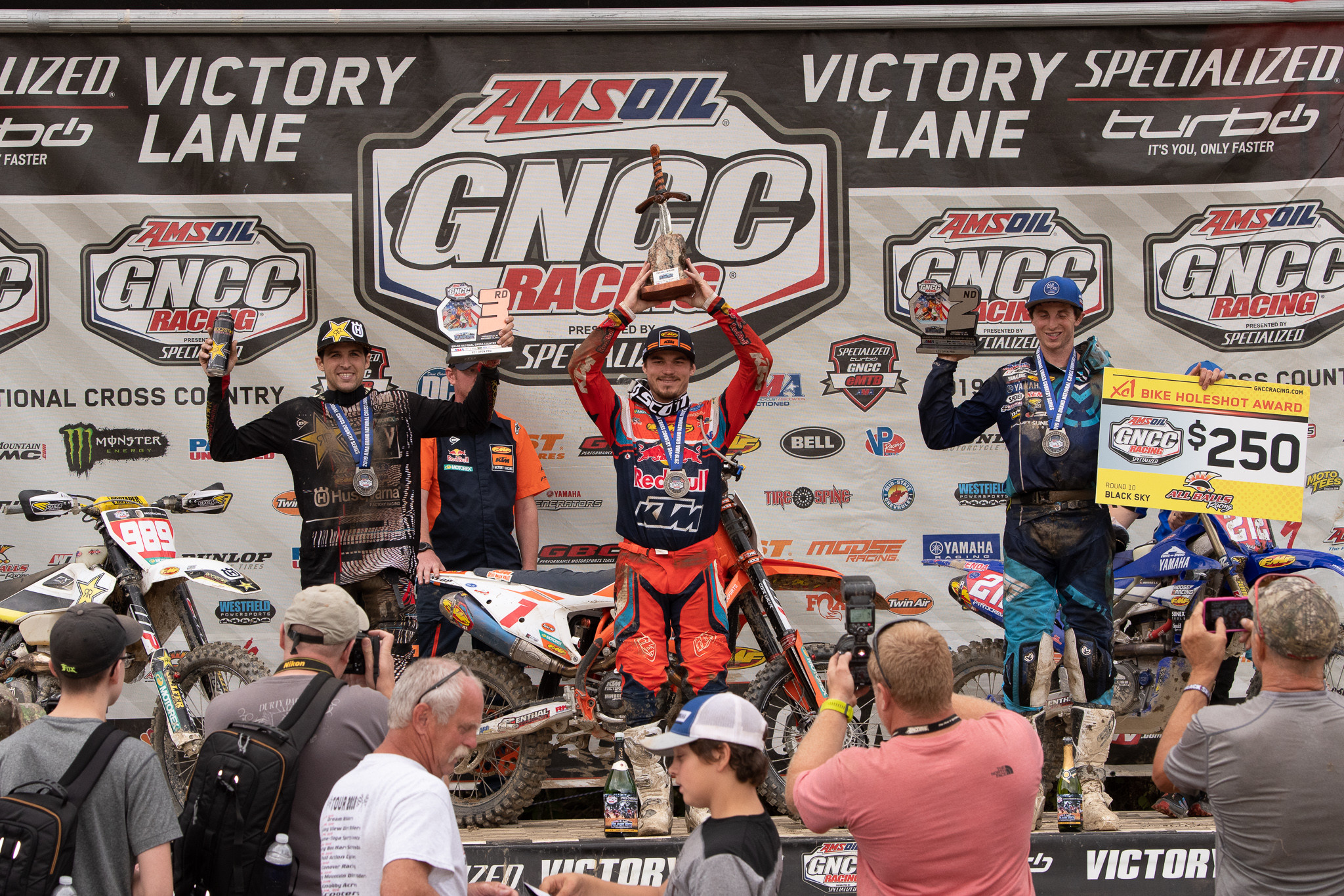 The XC1 podium at the tenth round Black Sky GNCC.