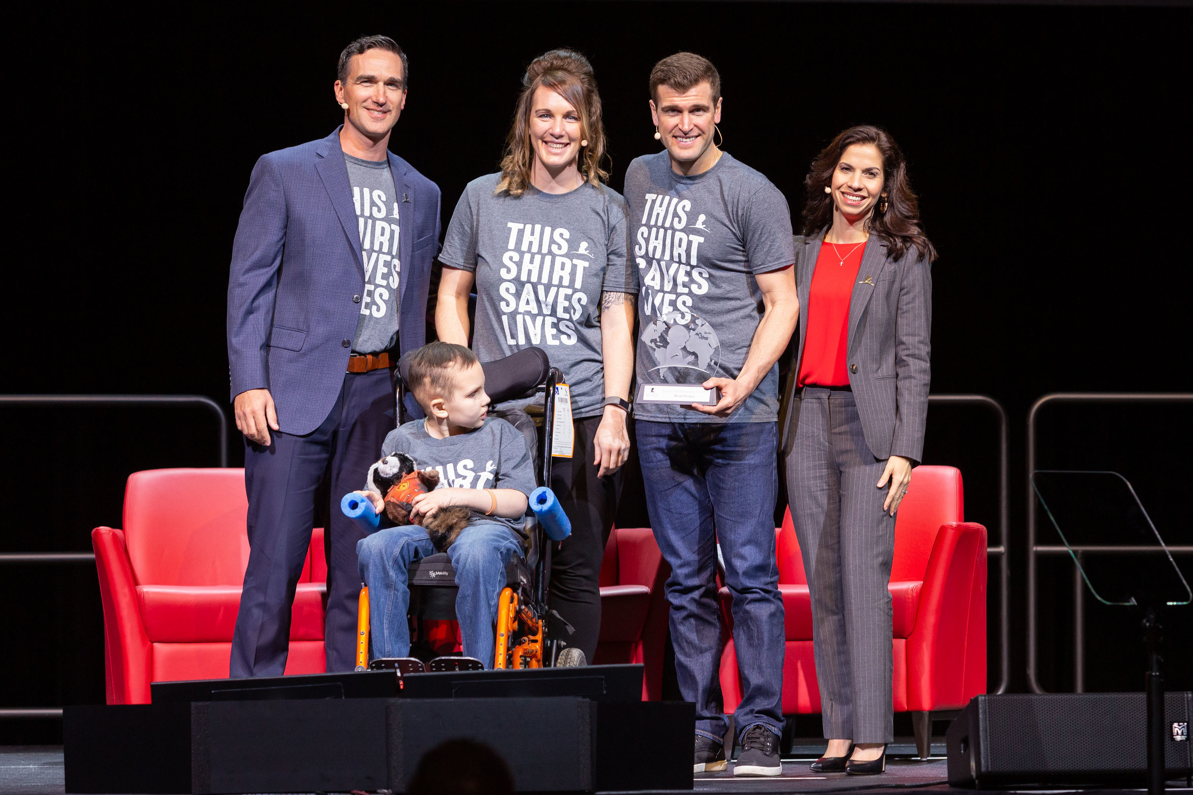 Ryan Dungey, 4-time AMA Supercross Champion, was recently presented with the 2019 St. Jude Ambassador of the Year award alongside Gabe, a St. Jude patient, motocross racer and Ryan's biggest fan. Photographed from left to right: Dave Prater, Andrea (Gabe's Mom), Ryan Dungey, Evelyn Homs and Gabe (St. Jude Patient).