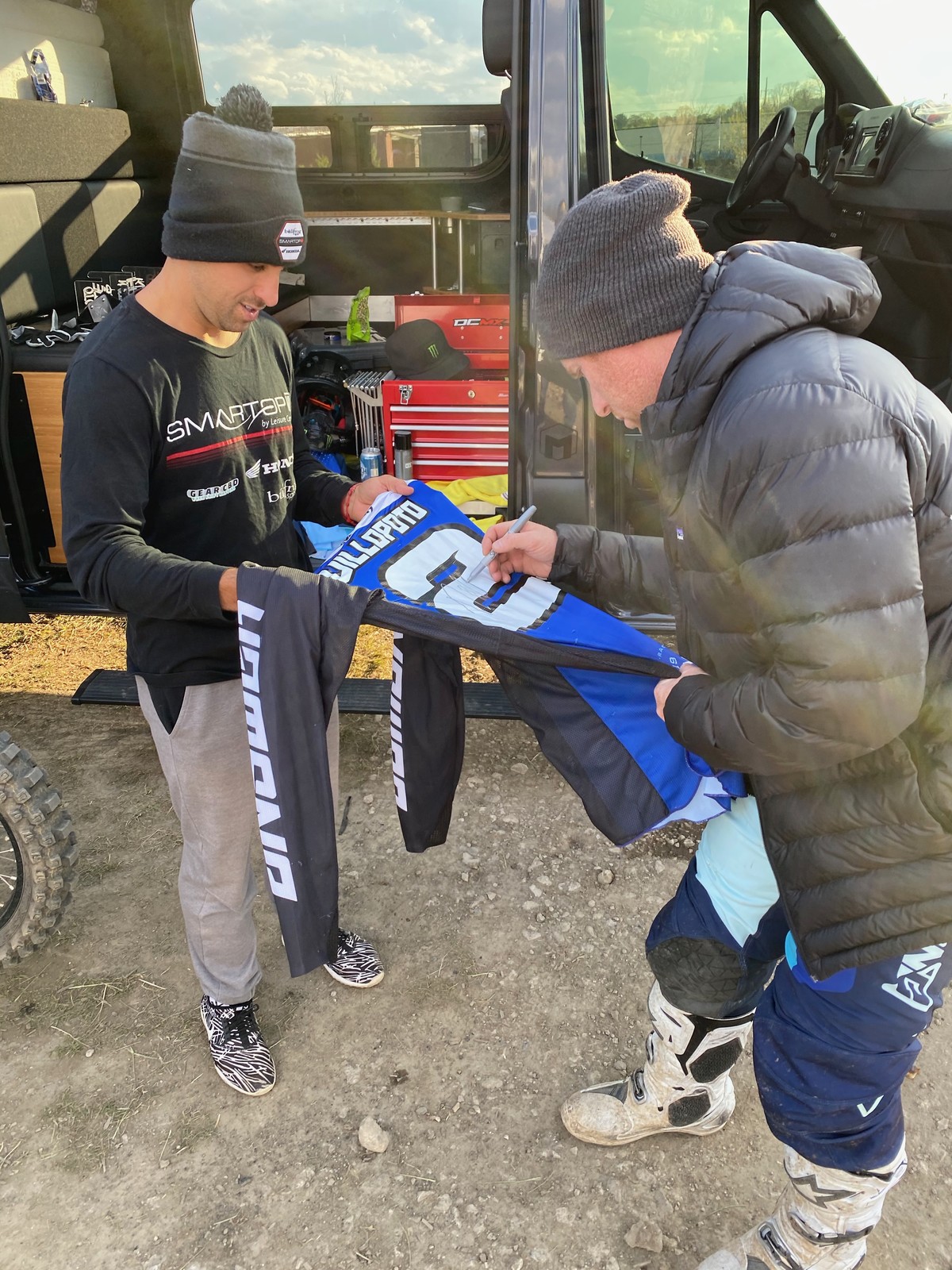 RV signing a jersey for Alessi.