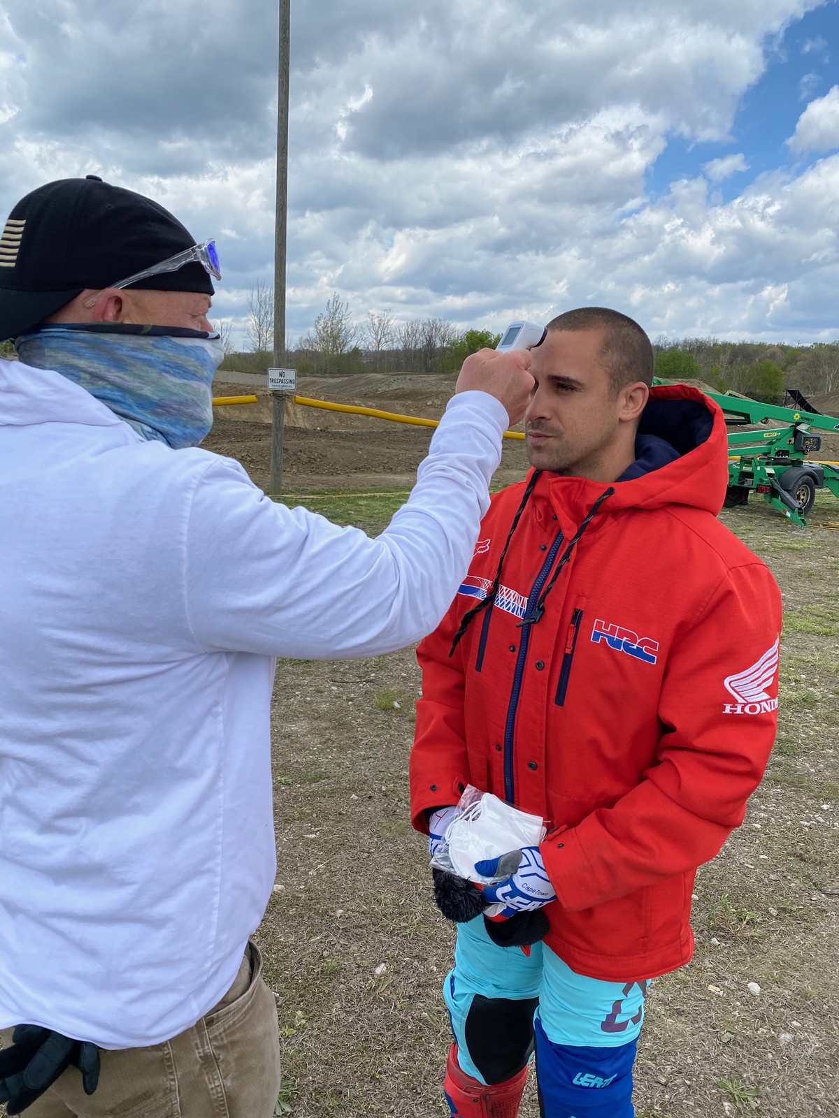 Alessi getting his temperature taken.