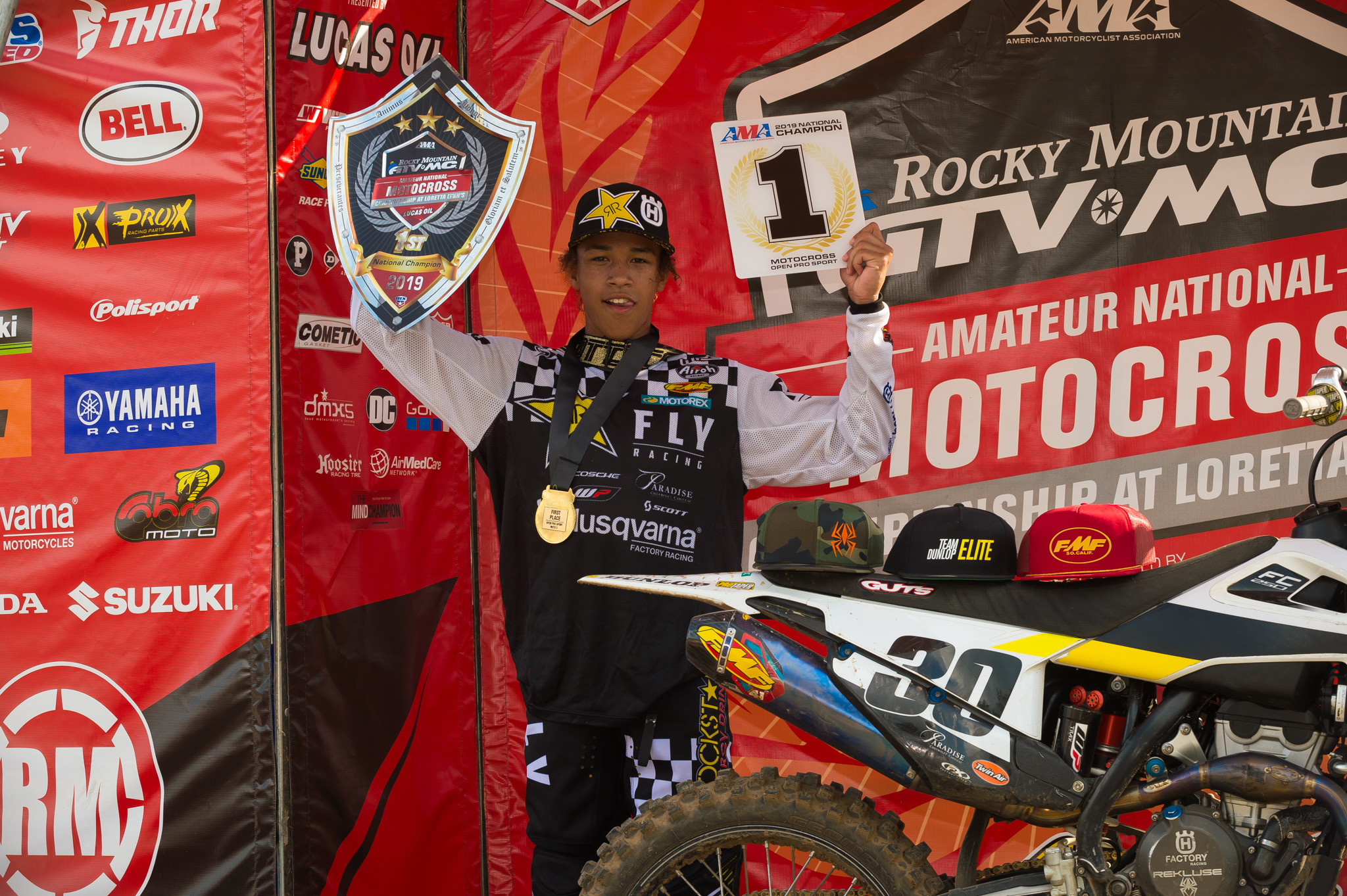 Swoll on the podium with his 2019 Open Pro Sport overall #1 plate.