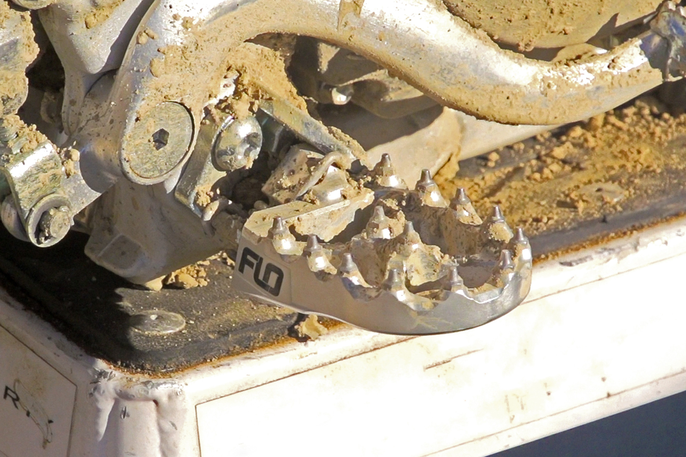 Racer X Garage: Flo Motorsports Lowering Foot Pegs