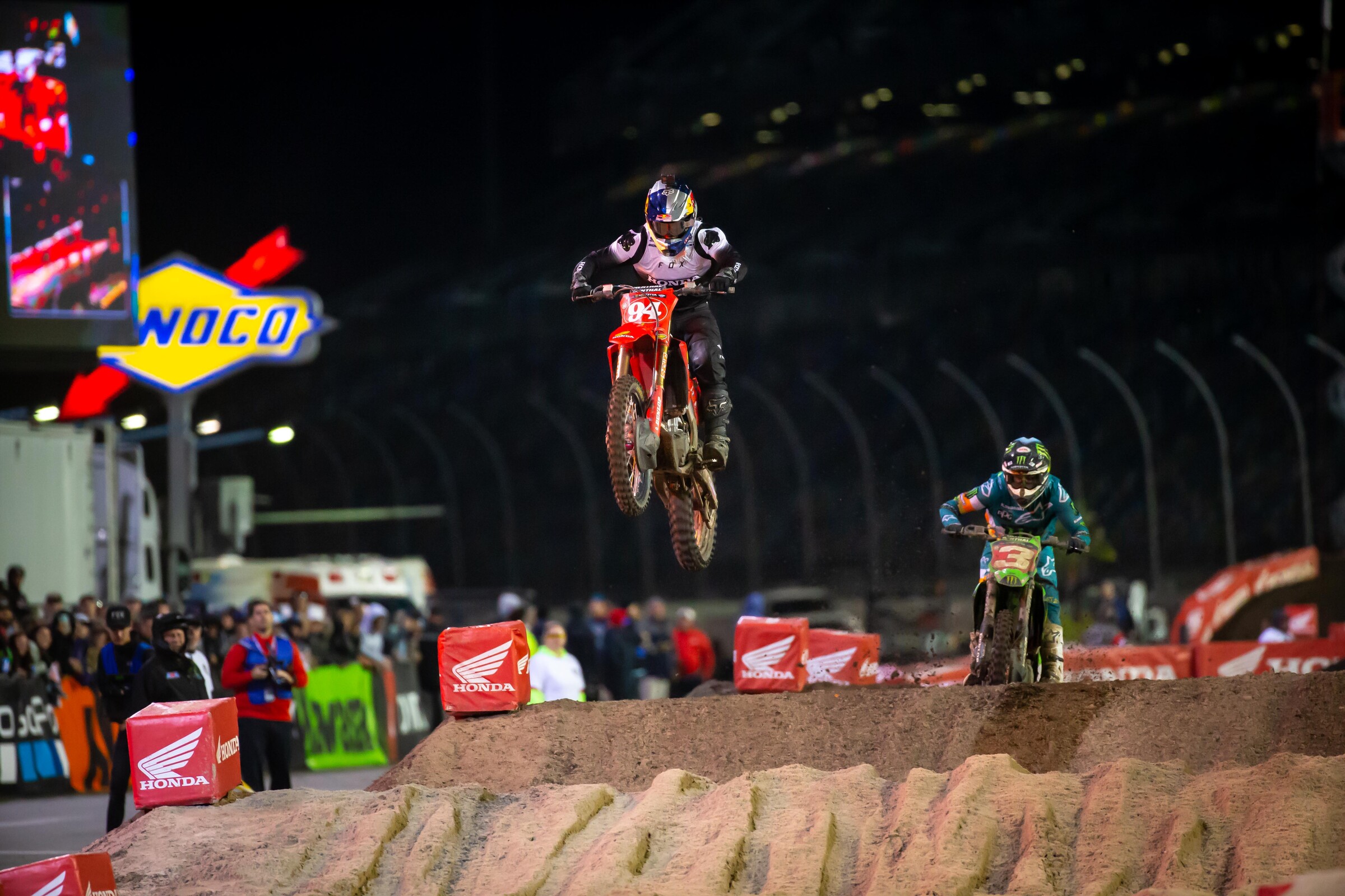Roczen leading a charging Tomac.