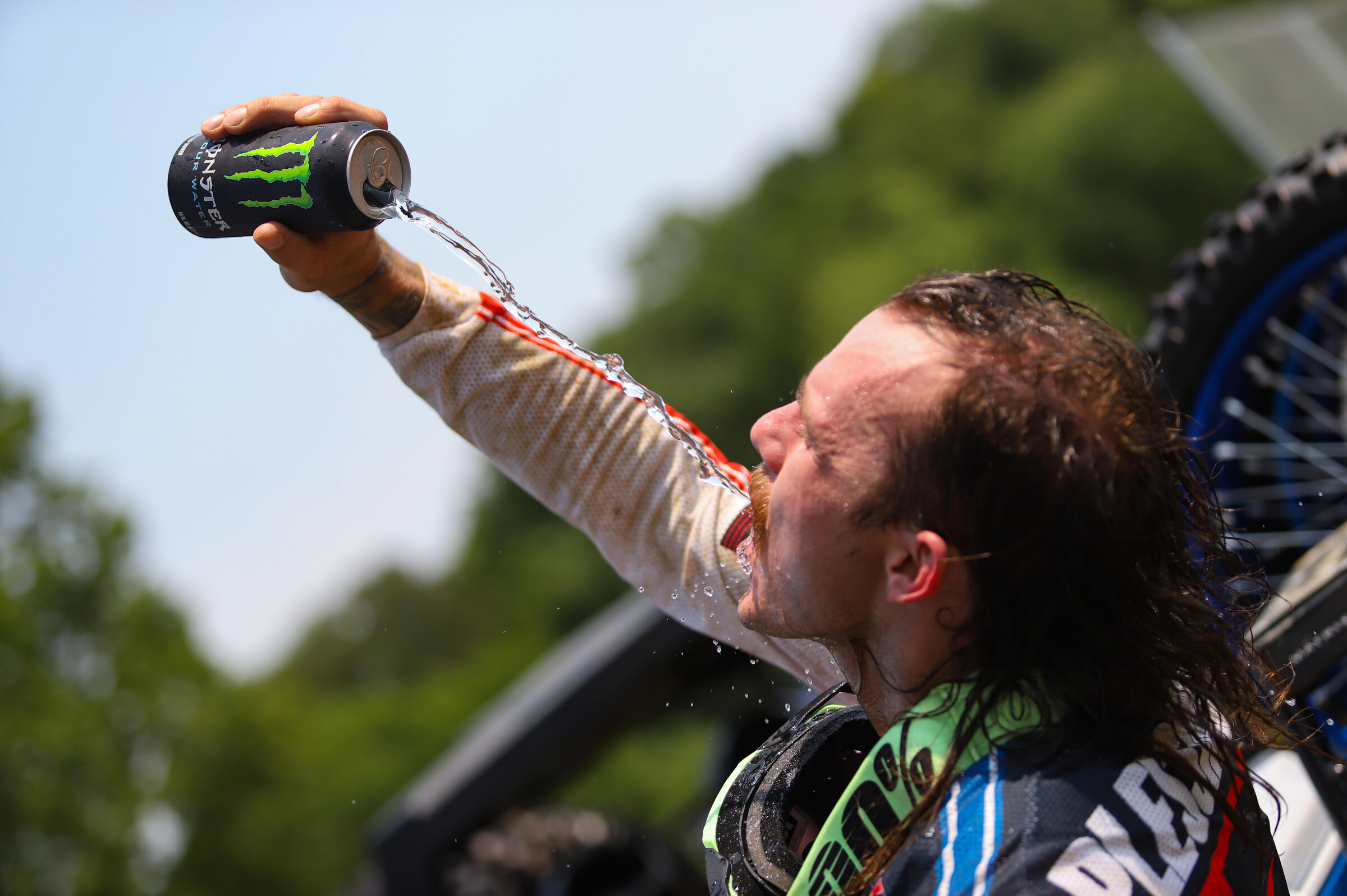AP celebrates for the chanting fans after his finish in the first moto.