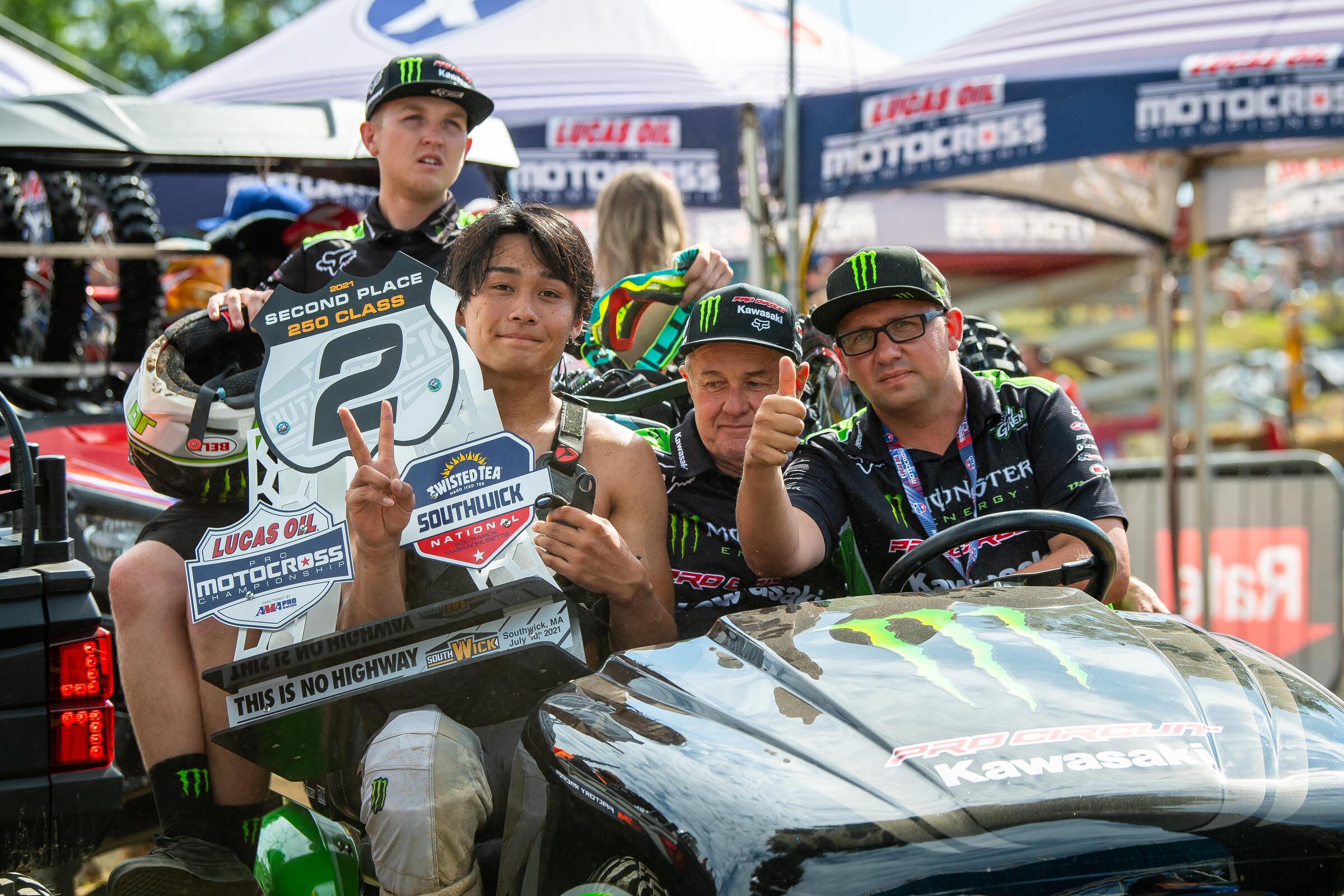 Shimoda with the Kawasaki crew after his maiden overall podium finish.