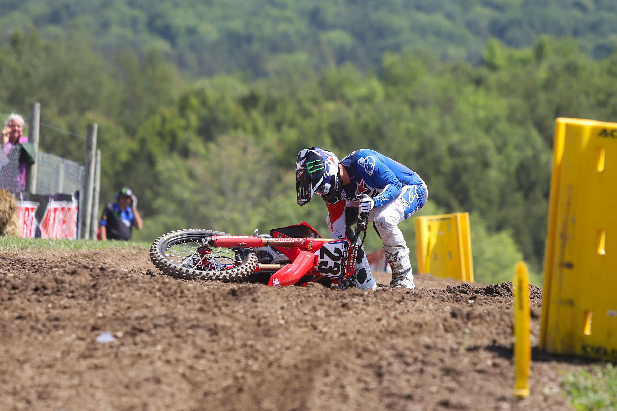 Chase Sexton picks his bike up at the holeshot stripe.