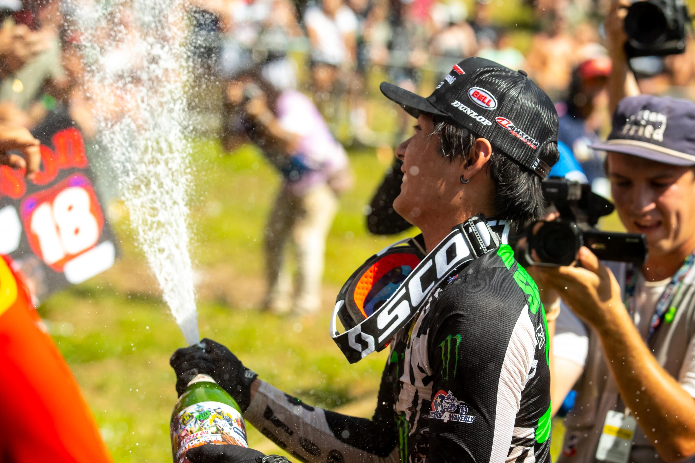 Shimoda celebrates with fans.