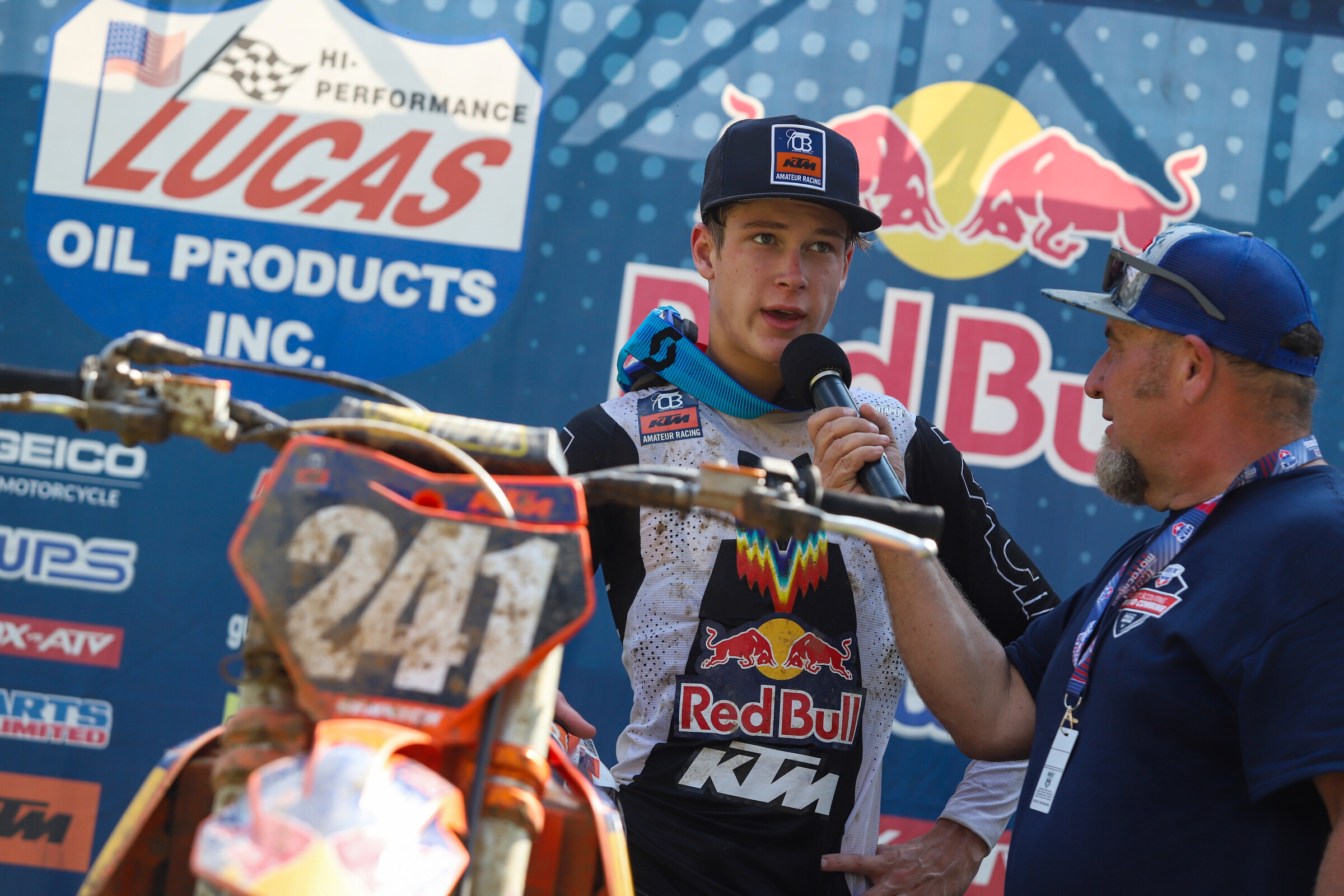 Daxton Bennick with Rob Buydos on the podium.