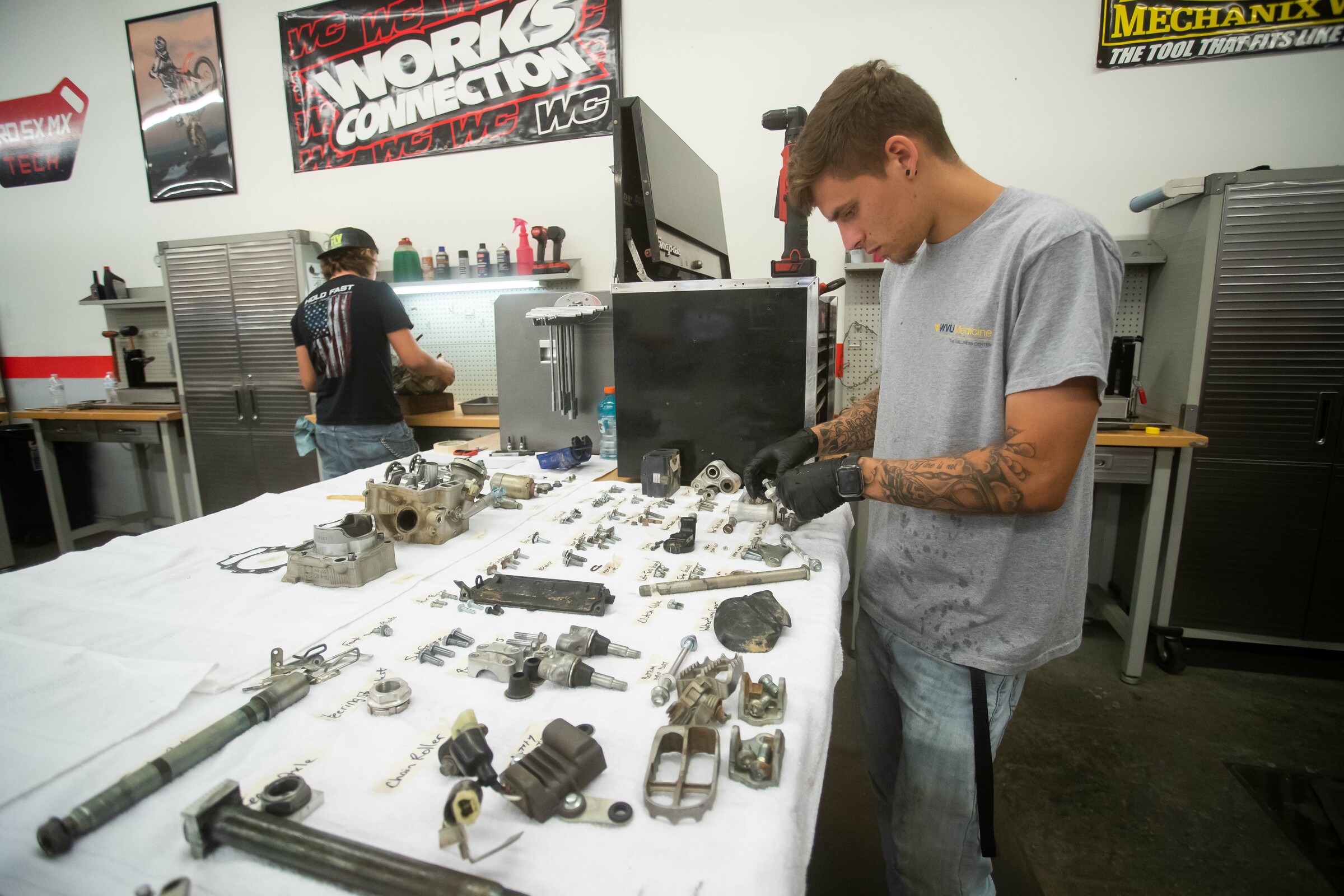 Students work on their respective bikes at Pro SX MX Tech.
