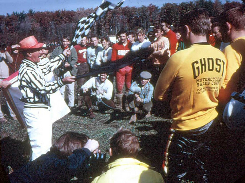 Roger DeCoster (near right) and Joel Robert in Ghost CZ shirts, circa 1969, and that's Barry Higgins in red under the flags.
