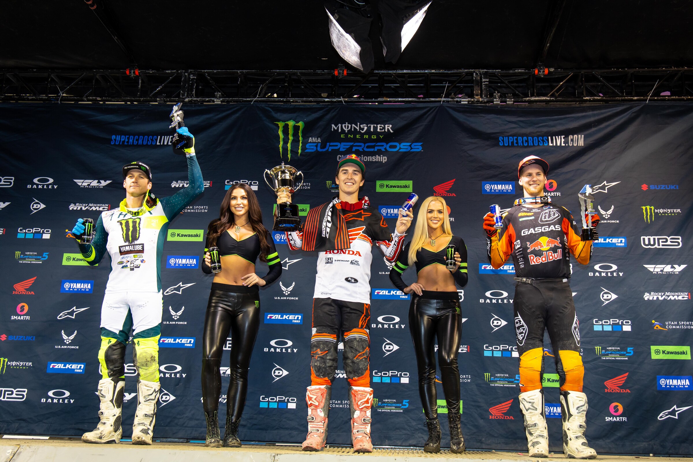 The 2022 Seattle Supercross 250SX podium: Hunter Lawrence (center, first), Christian Craig (left, second), and Michael Mosiman (right, third).