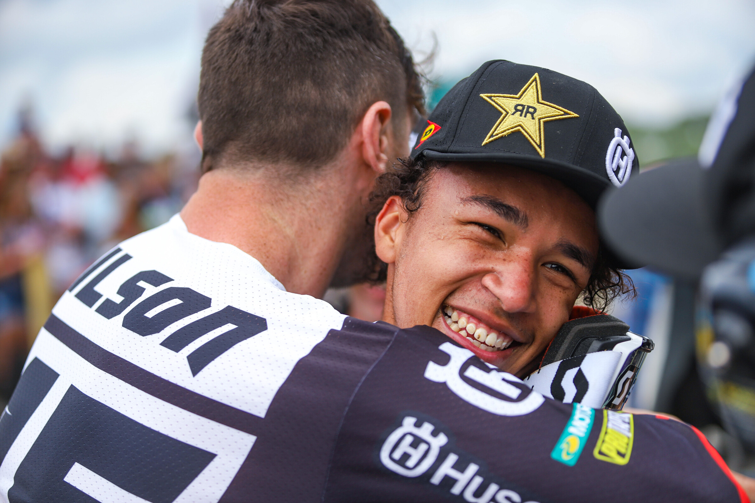 Swoll embraces Dean Wilson.