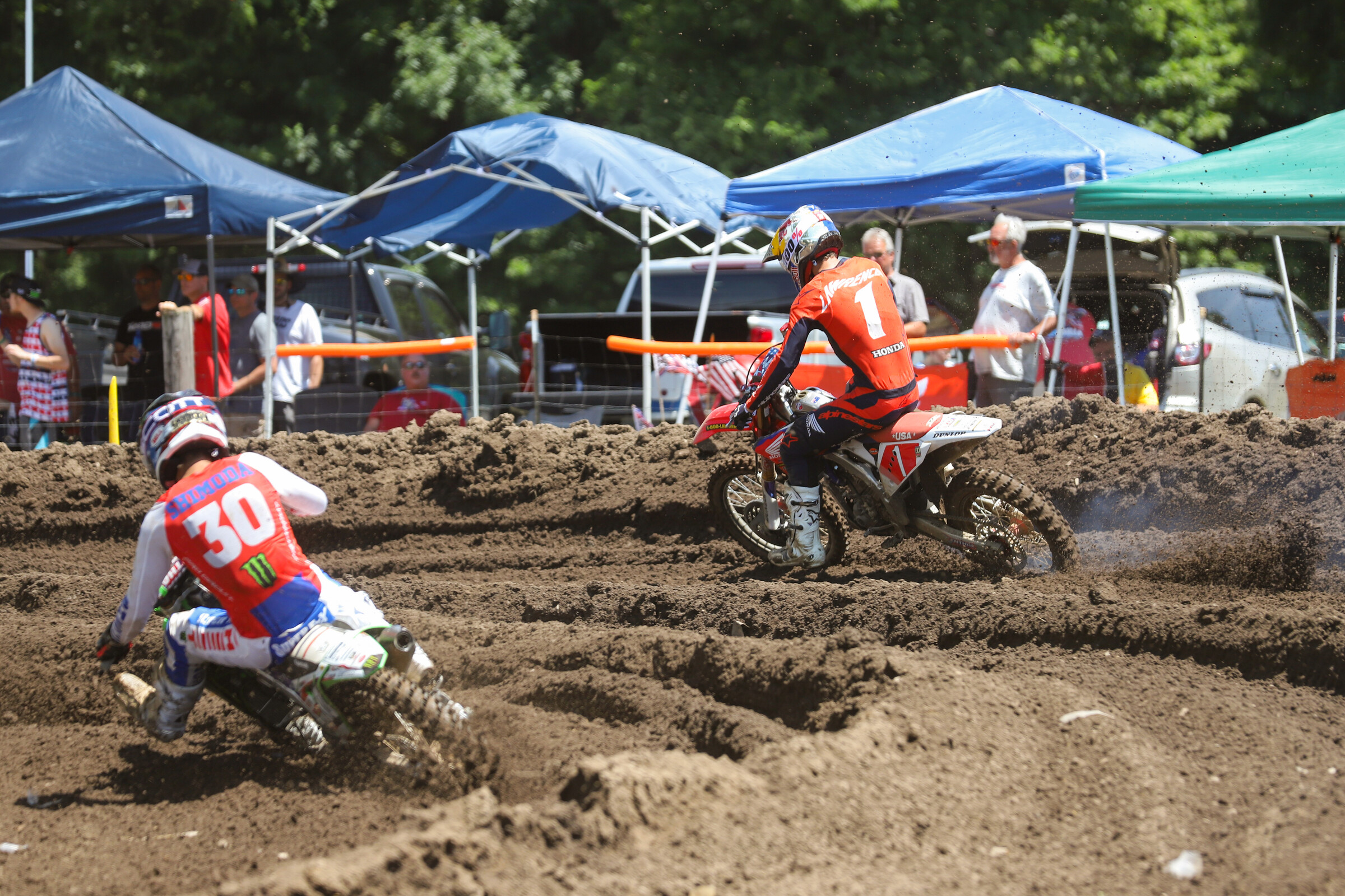 Hunter Lawrence and Jo Shimoda (left) sneak to the inside to move into first and second.