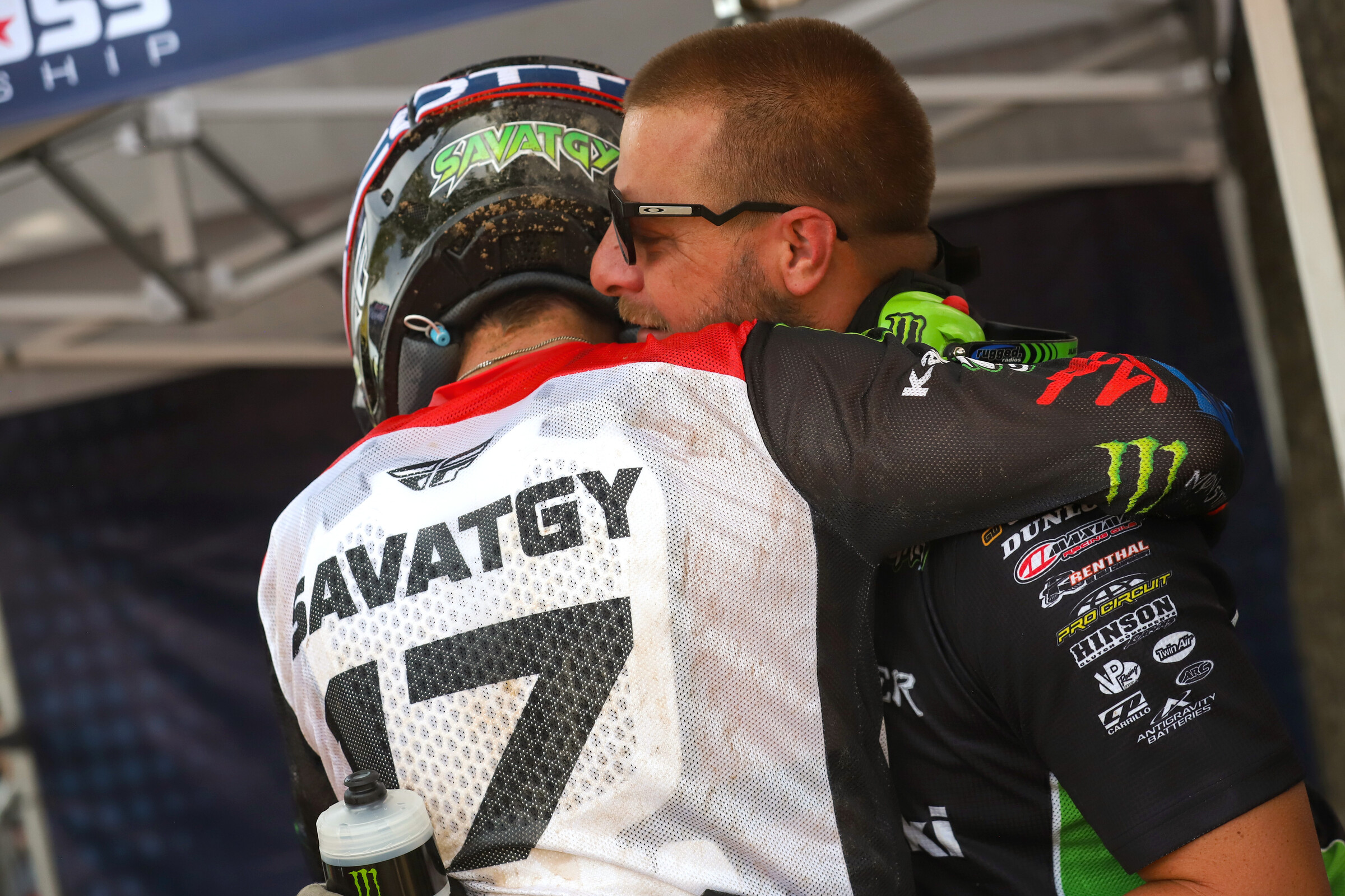 Savatgy gets a hug from his mechanic Justin Shantie.