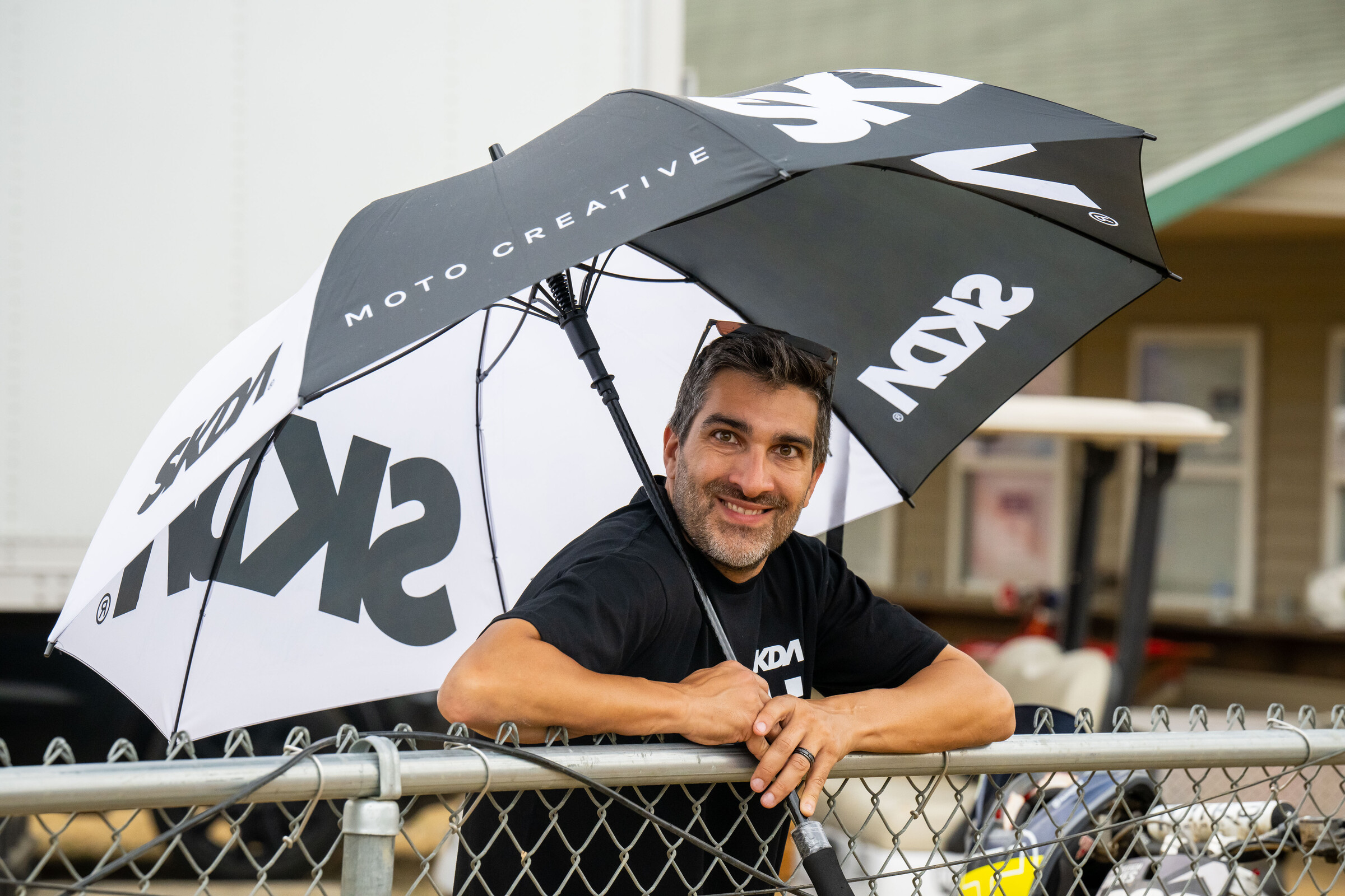 Kuzo staying dry under his matching SKDA rain-blocker.