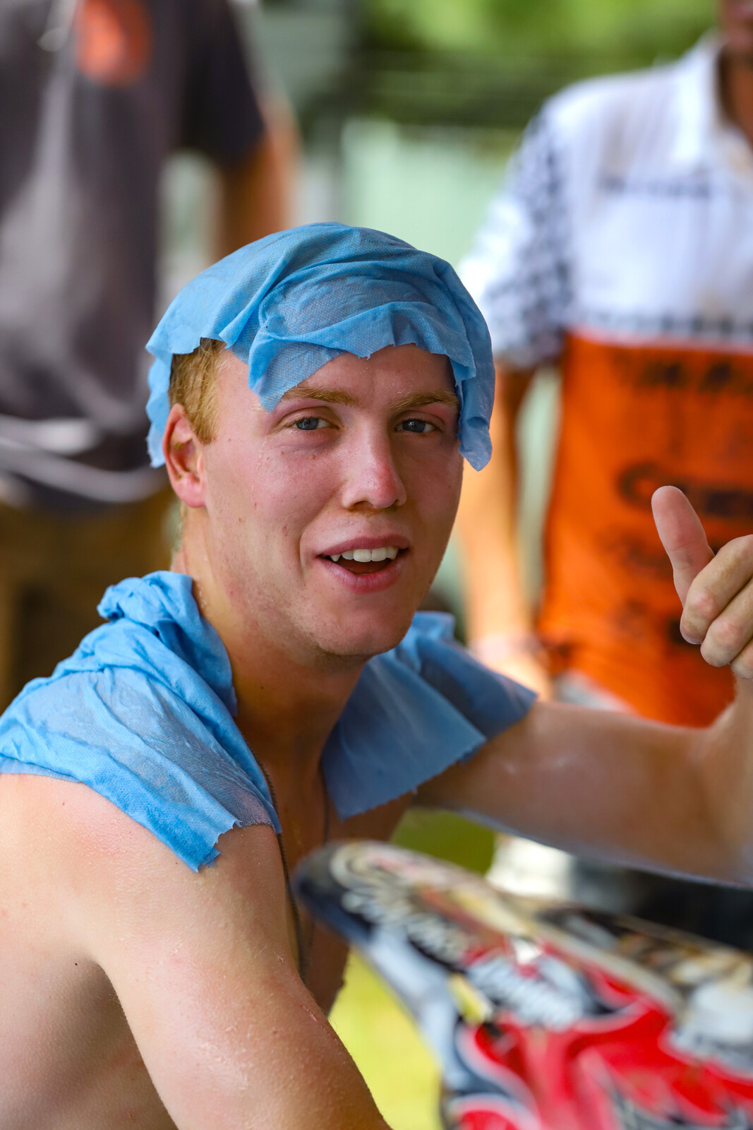 Stepek with a thumbs up while cooling down after the first moto.