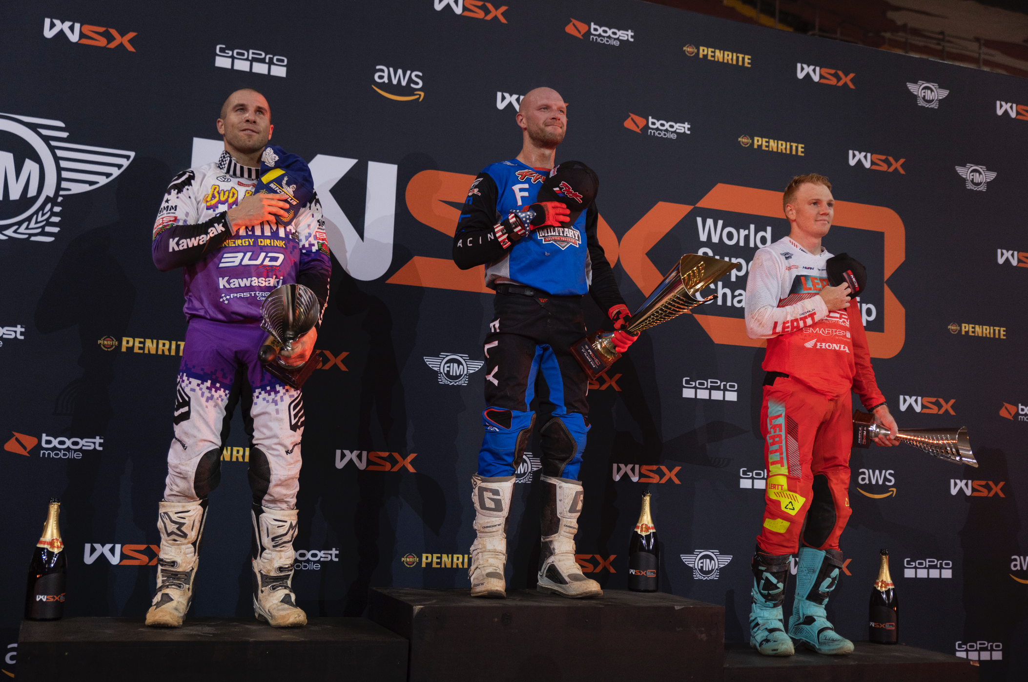 SX2 overall podium: Shane McElrath, Chris Blose, and Mitchell Oldenburg.