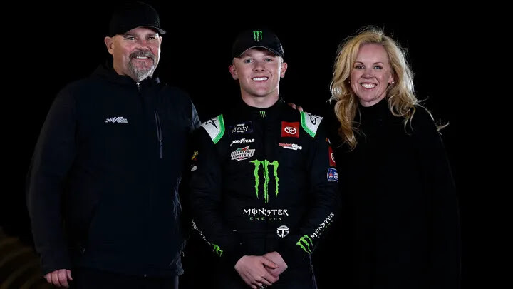 Coy, his wife Heather, and his son Ty celebrating the NASCAR Xfinity Series title.