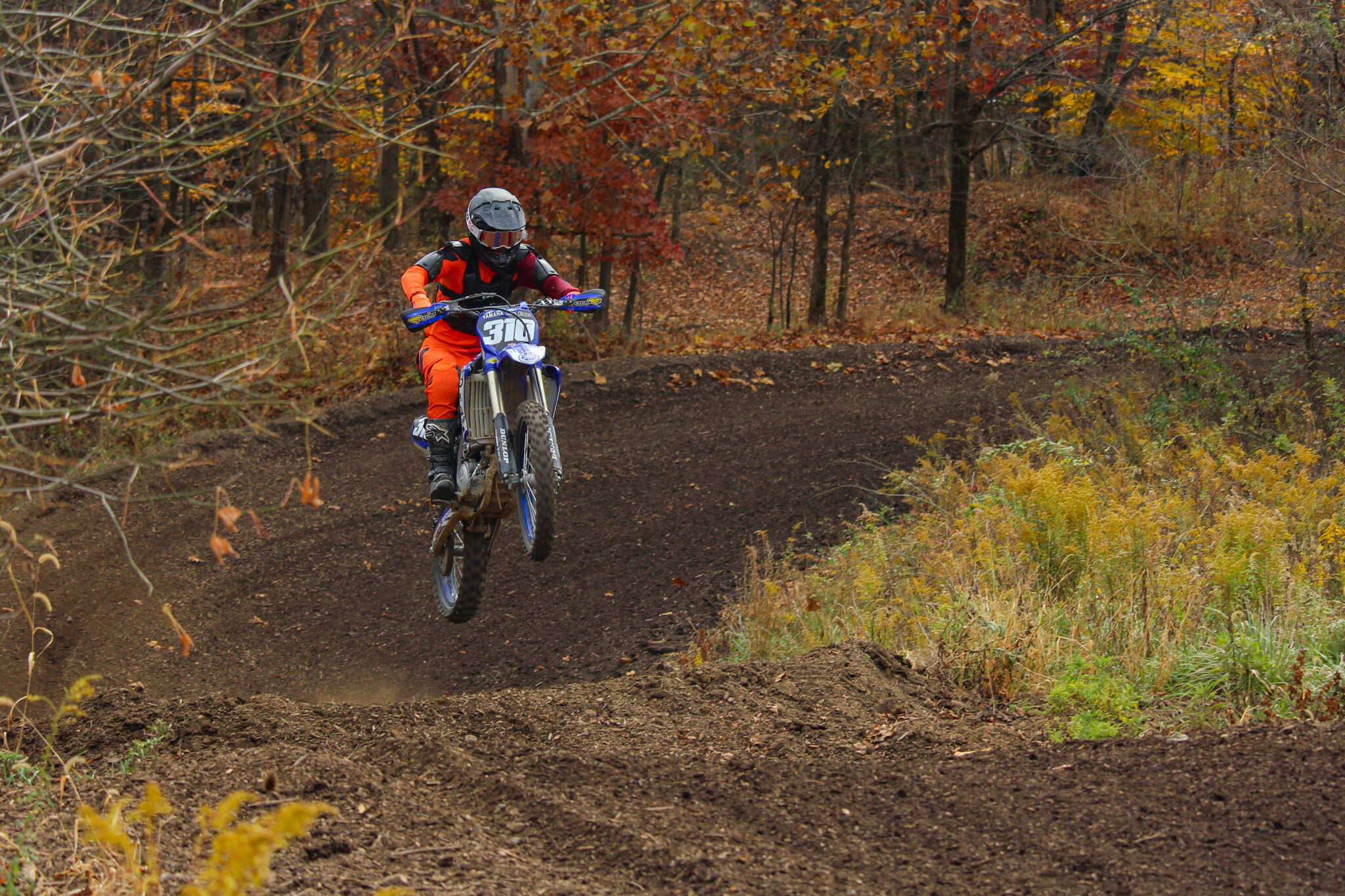 Mitch Kendra on the same uphill jump, November 2022.