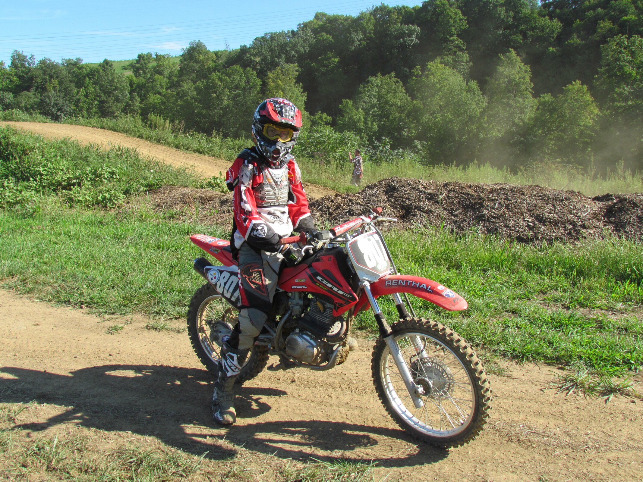 Mitch Kendra in the parking lot between motos, circa 2010.