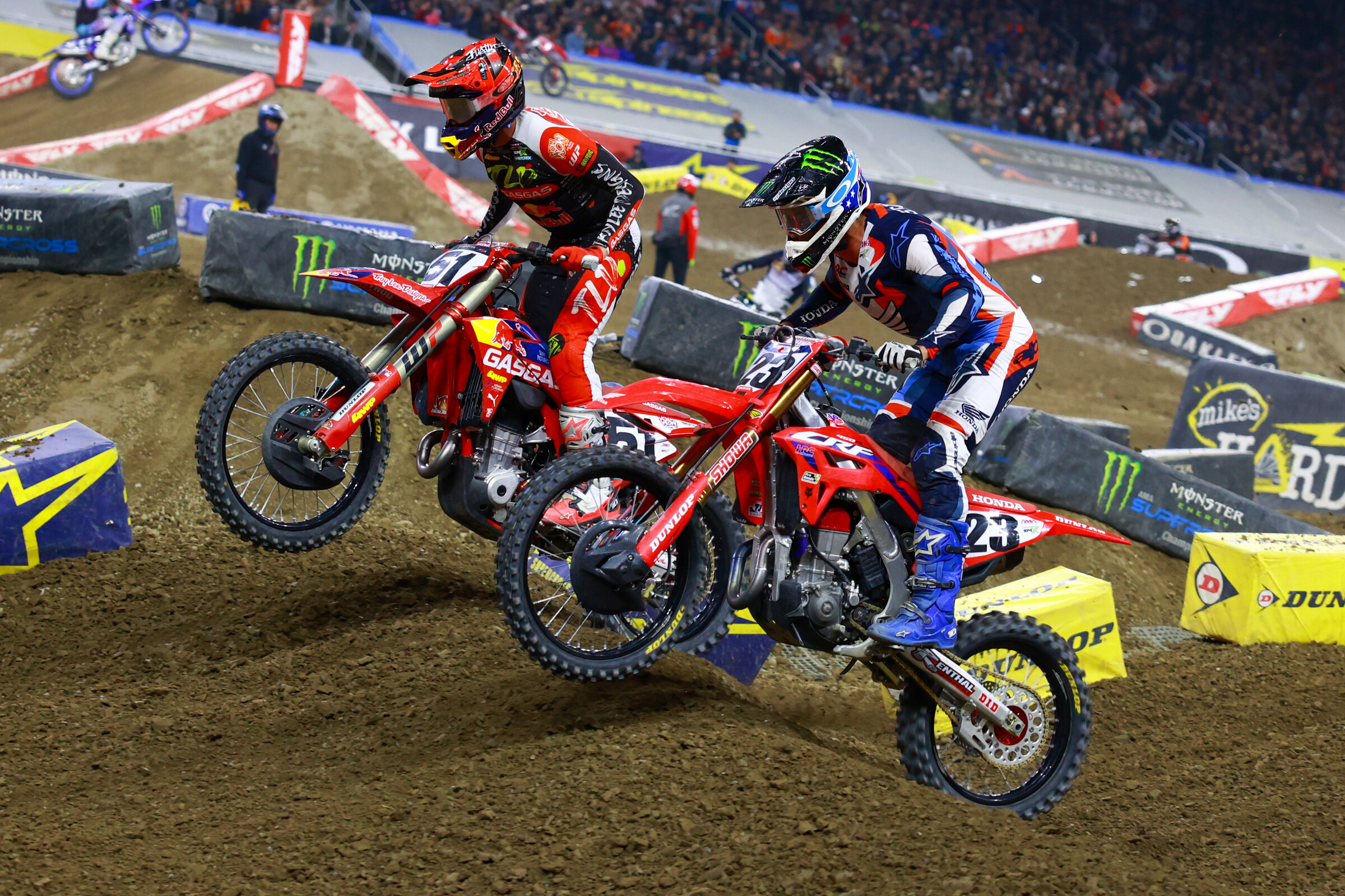 Justin Barcia and Chase Sexton battling.