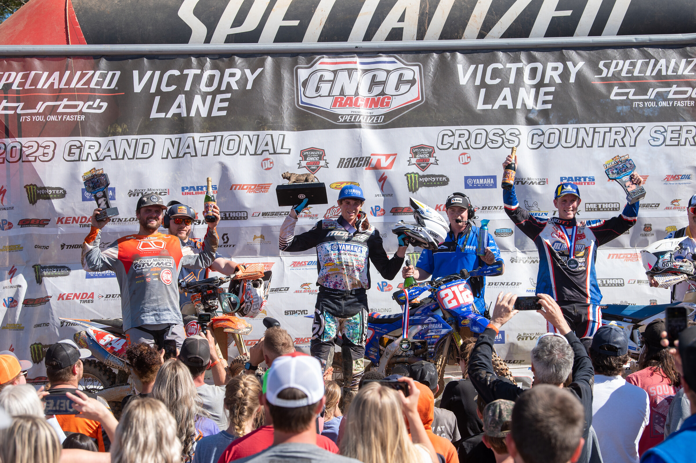 Ricky Russell (center), Steward Baylor (left) and Jordan Ashburn (right) rounded out the top three overall finishers at the Dunlop Tires Tiger Run.