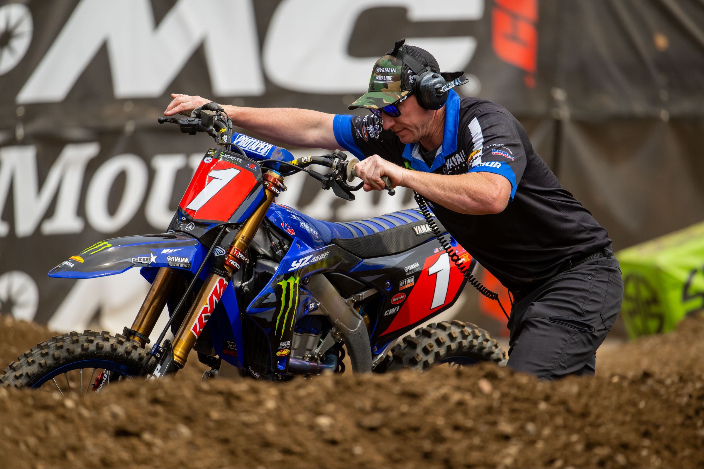 Tomac's race bike being pushed off after his crash.
